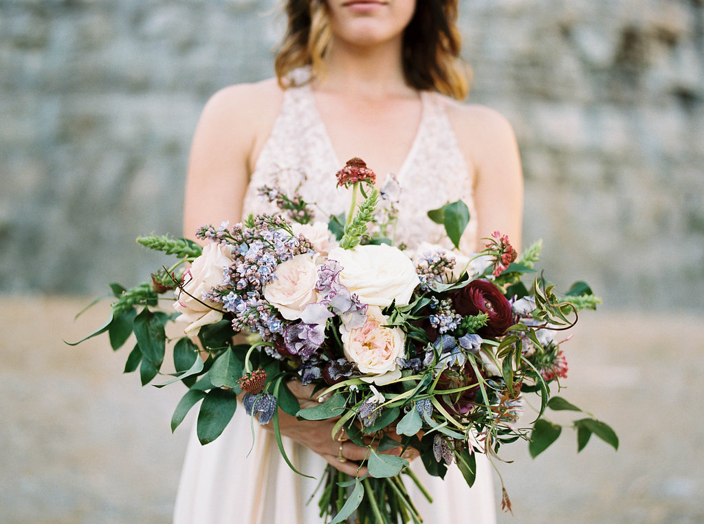Loose, natural bridal bouquet with lilacs and ranunculus // Nashville Wedding Floral Design