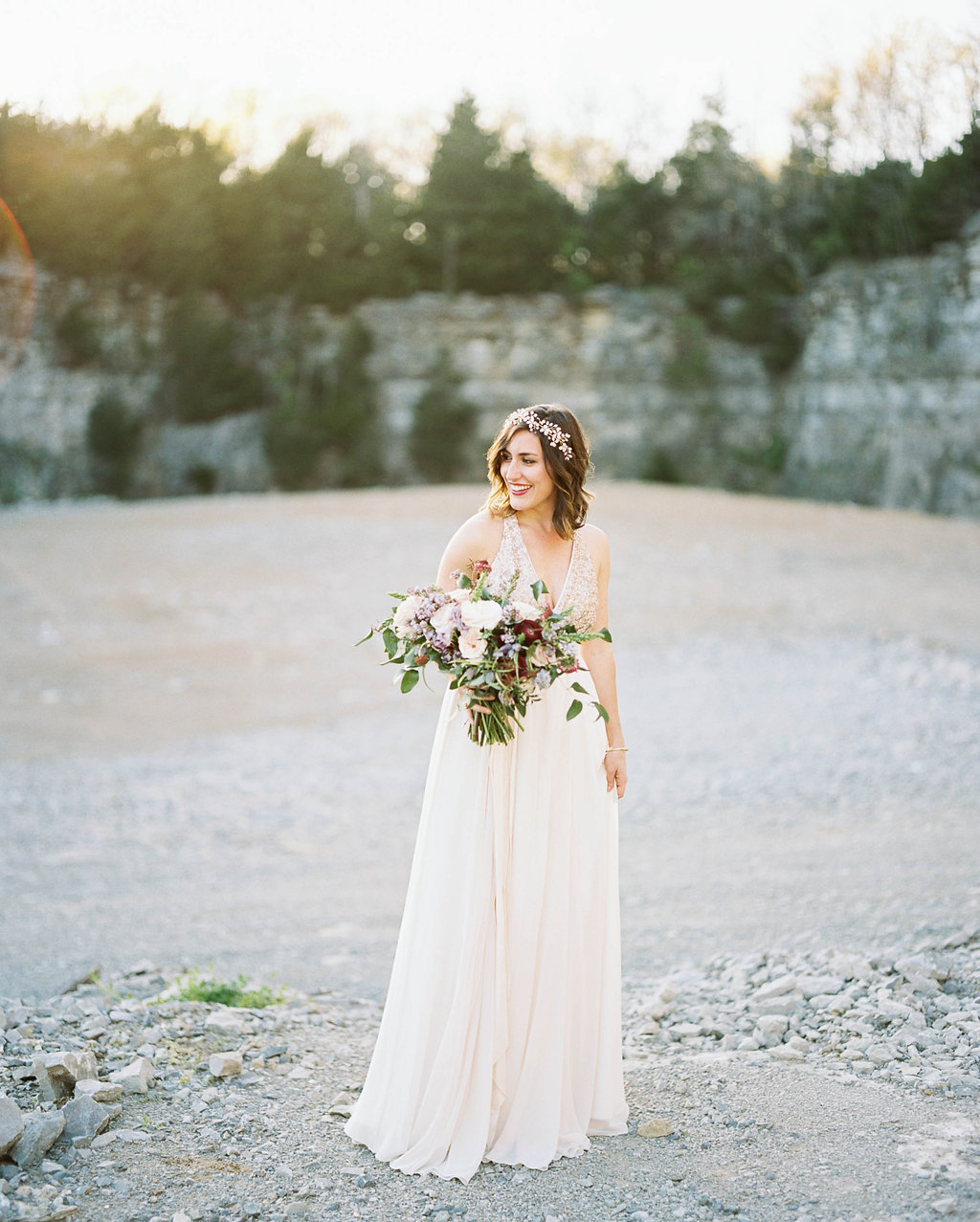 Rock quarry bridal portrait with lush, organic floral design // Nashville Florist