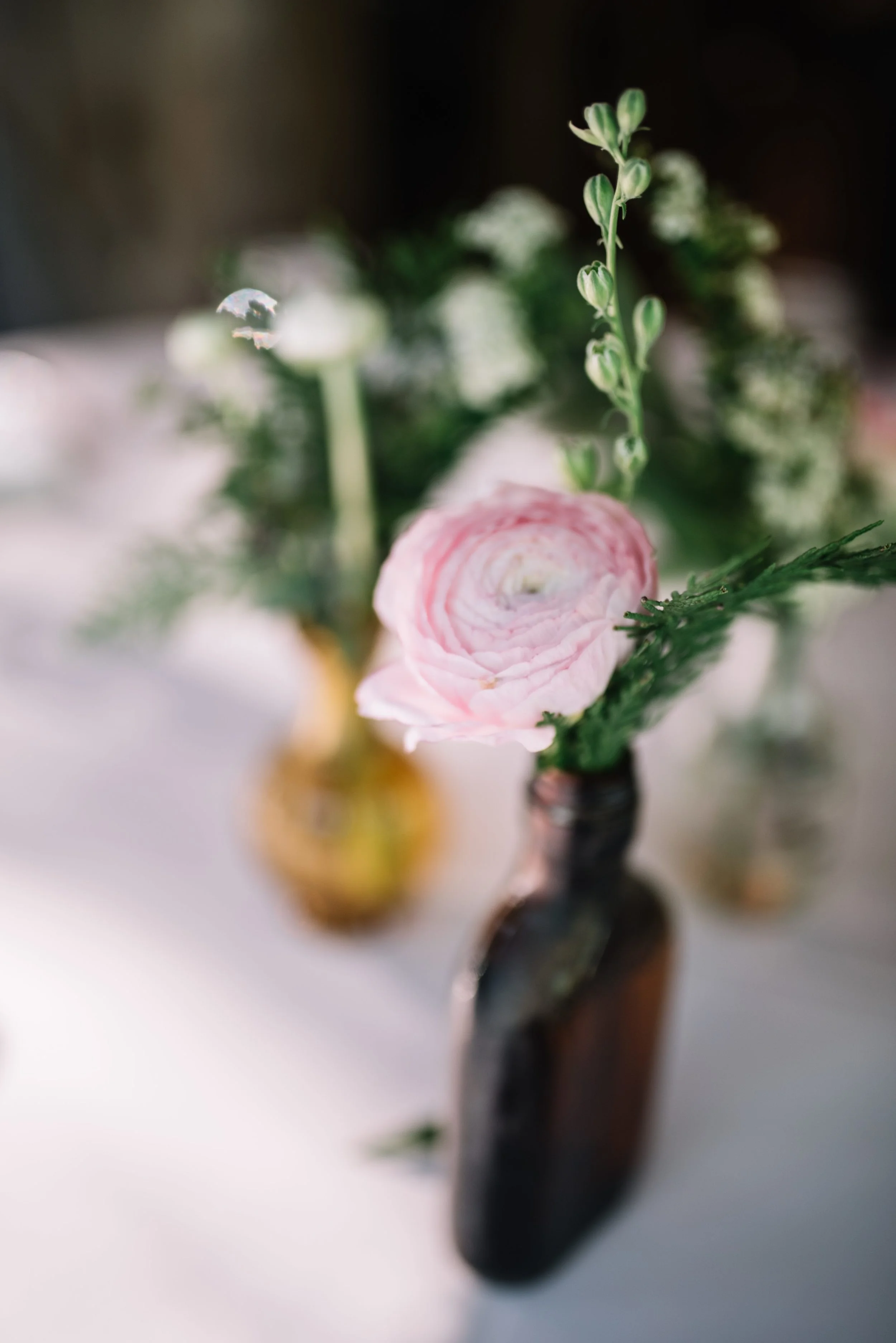 Amber bud vases with blush and white and greenery florals // Nashville Wedding Flowers