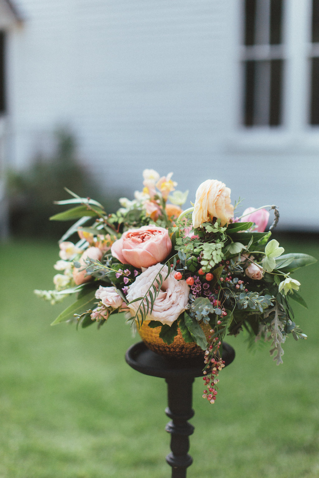 Peach ranunculus, garden roses, and loose greenery // Dallas Wedding Florals