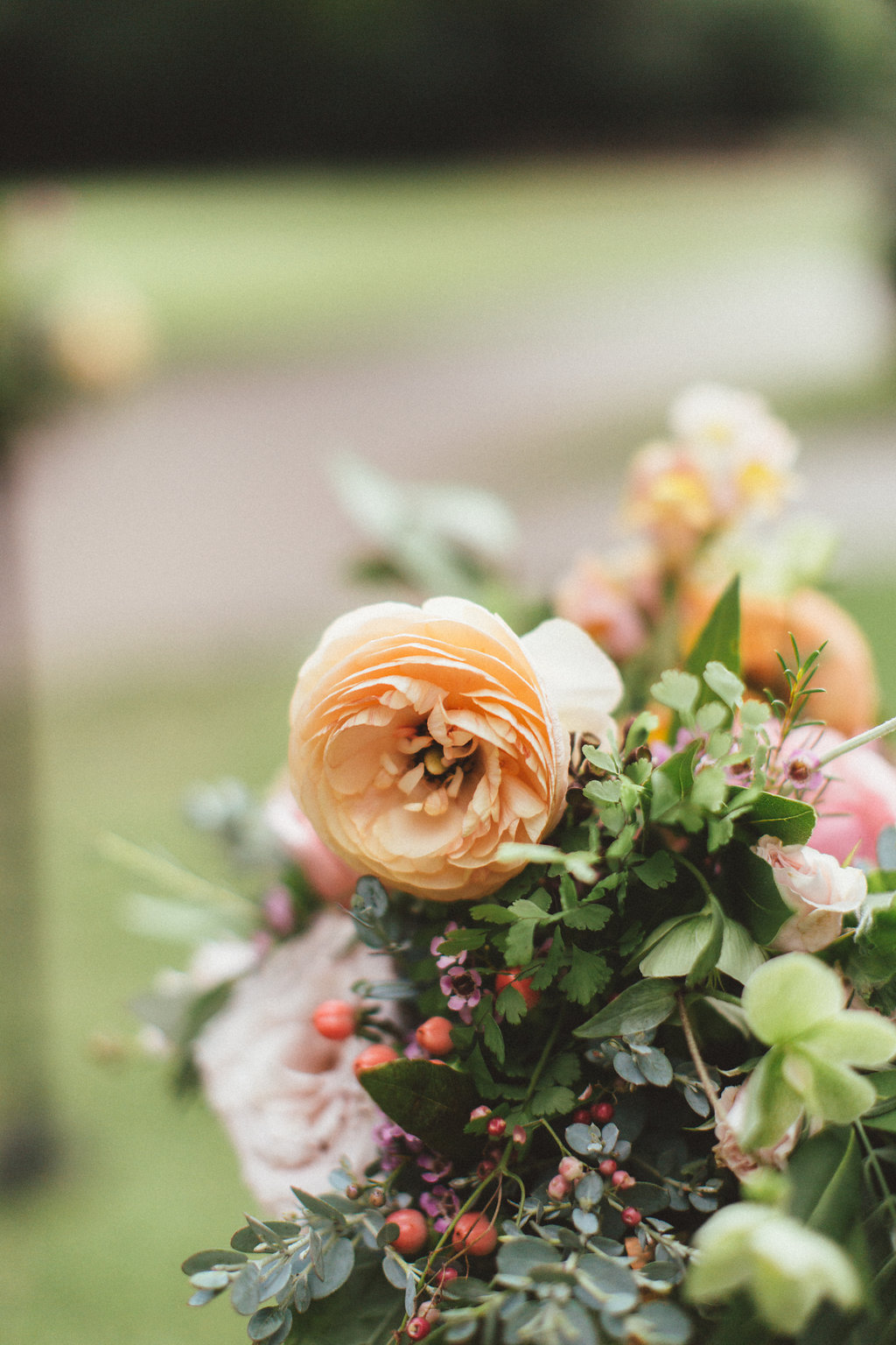 Peach ranunculus and lush greenery // Nashville Wedding Floral Design