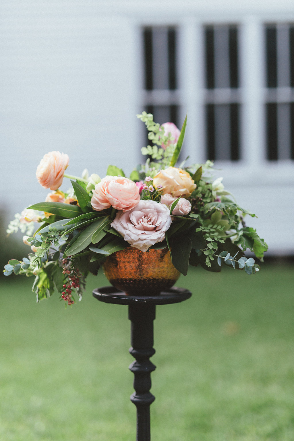 Copper bowl filled with peach and pink flowers // Natural Floral Design in Dallas/Nashville
