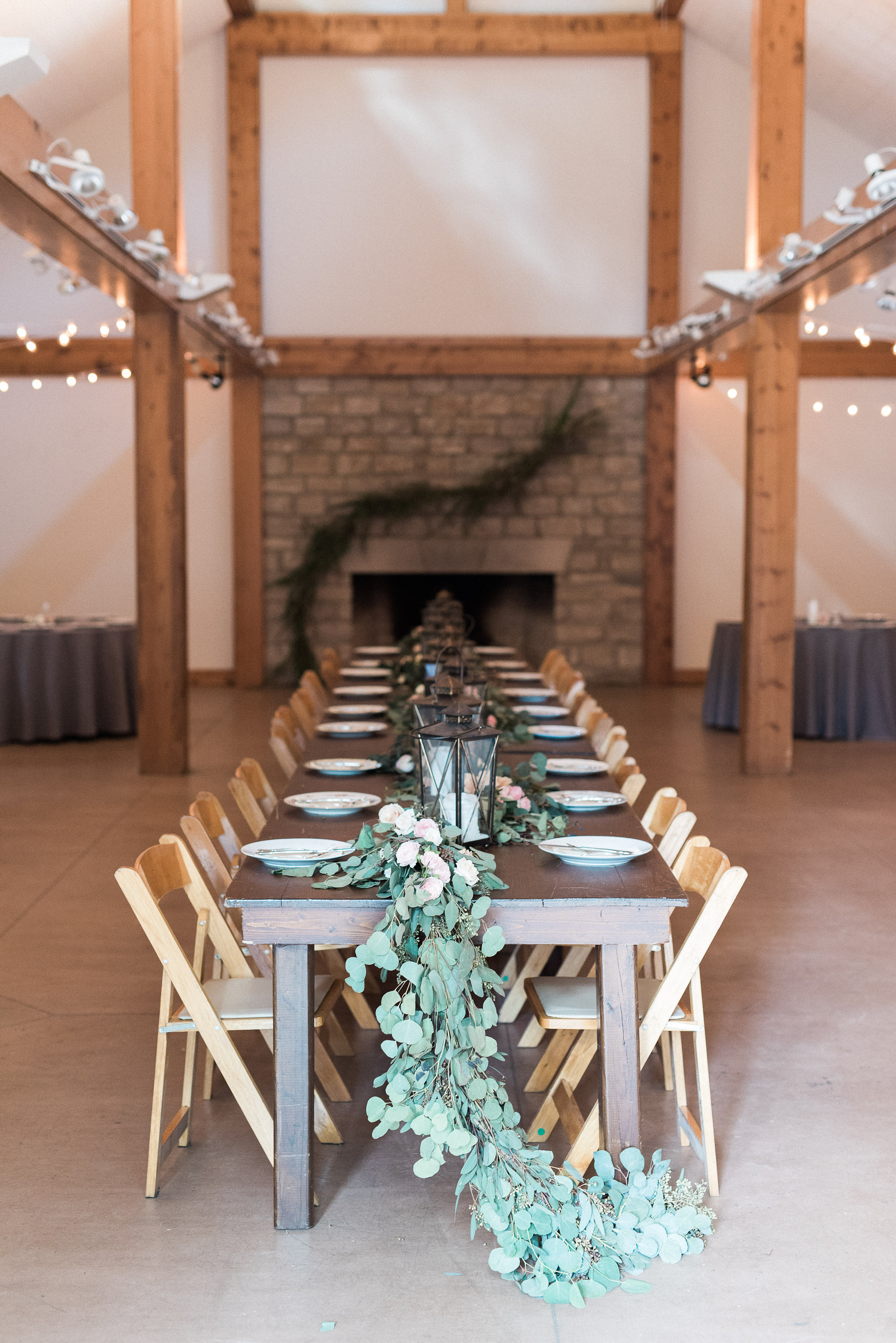 Eucalyptus Garland trailing off the ends of the head table // Nashville Wedding Florist