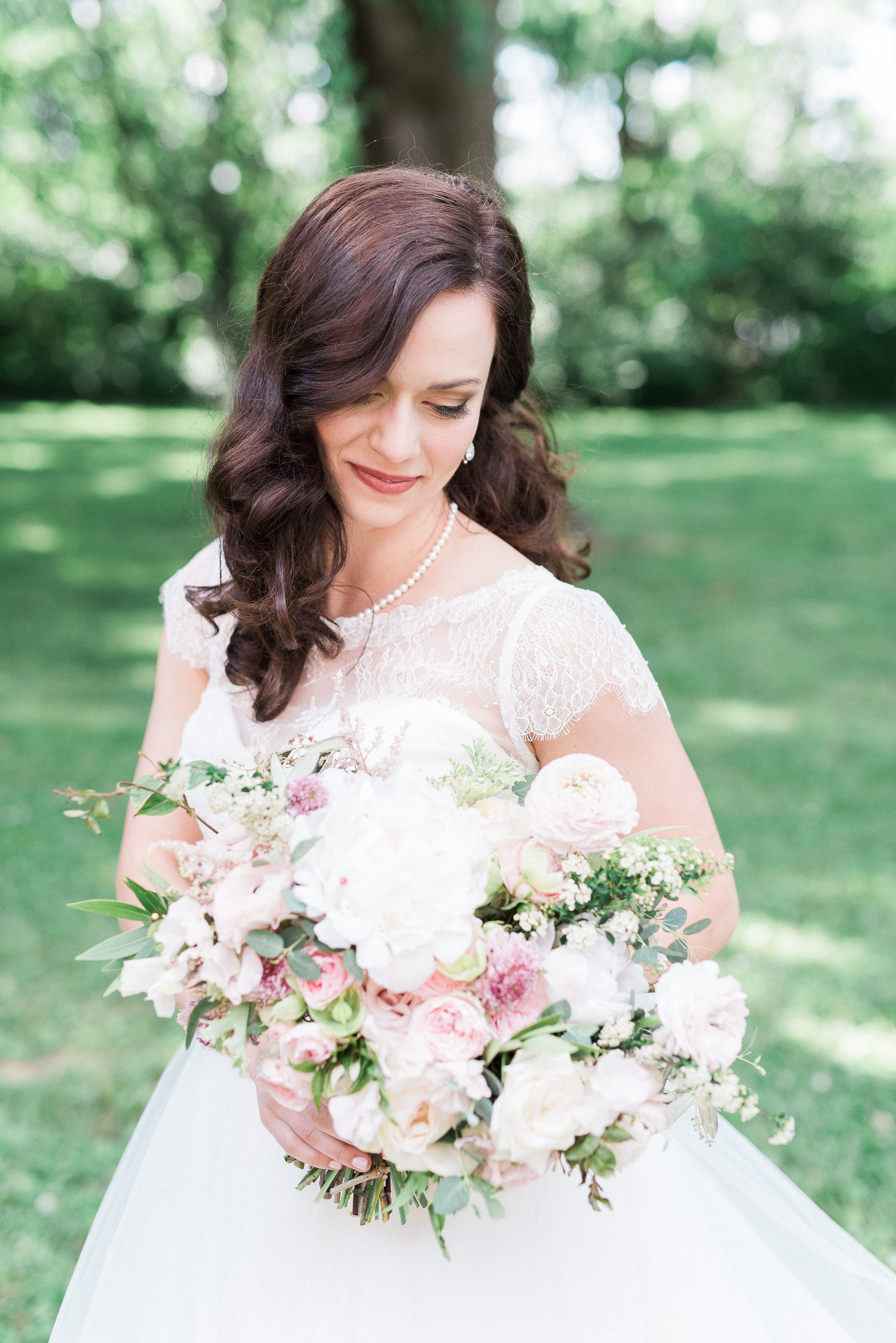 Garden inspired bridal bouquet with peonies, garden roses, and ranunculus // Nashville Wedding Florist