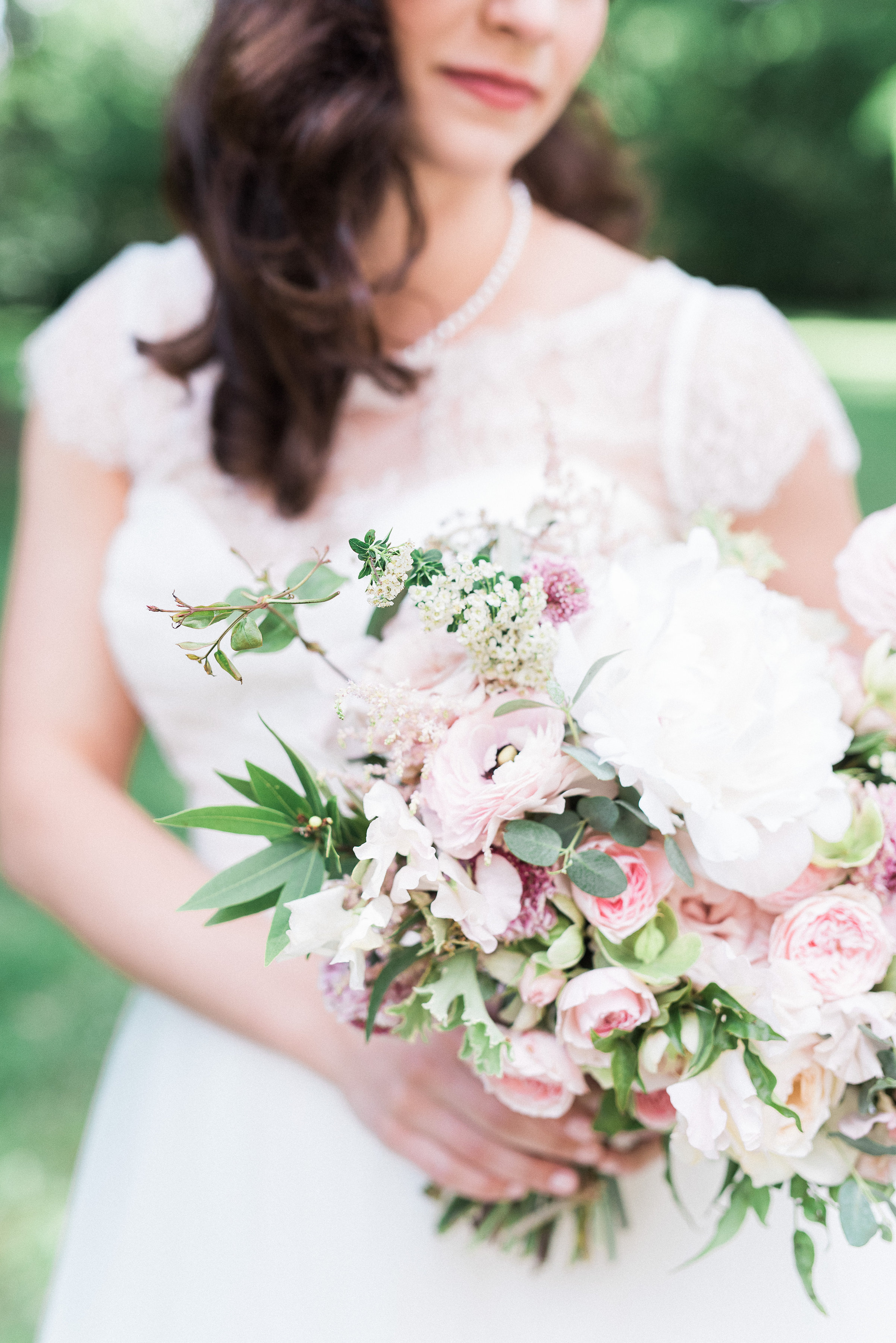Blush and ivory bridal bouquet with peonies and ranunculus // Nashville Wedding Florist