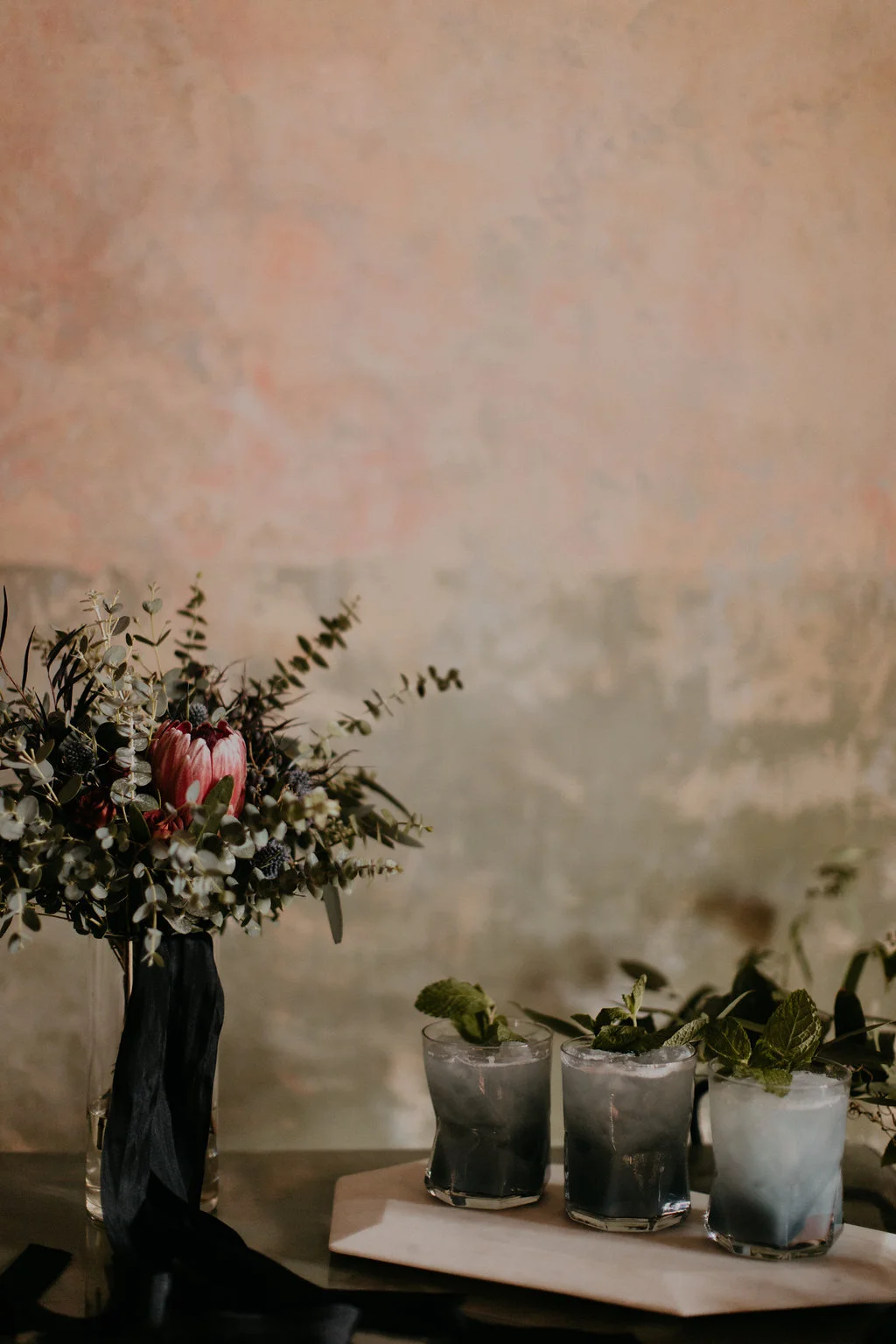 Marble candle holders, lush, wintry florals, fancy cocktails // Nashville Wedding Florist