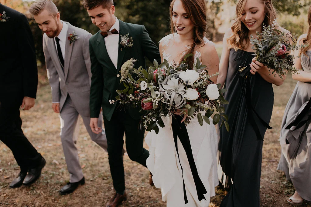 Wintry Bridal Bouquet with air plants, peonies, berries, eucalyptus, and loose, untamed greenery // Nashville Florist