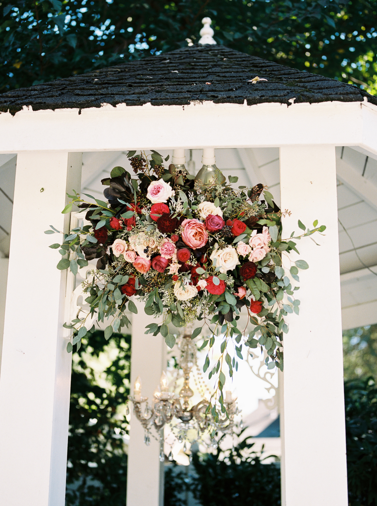 Gazebo Wedding Ceremony Backdrop with ombre pink to deep burgundy flowers // Nashville Wedding Florist