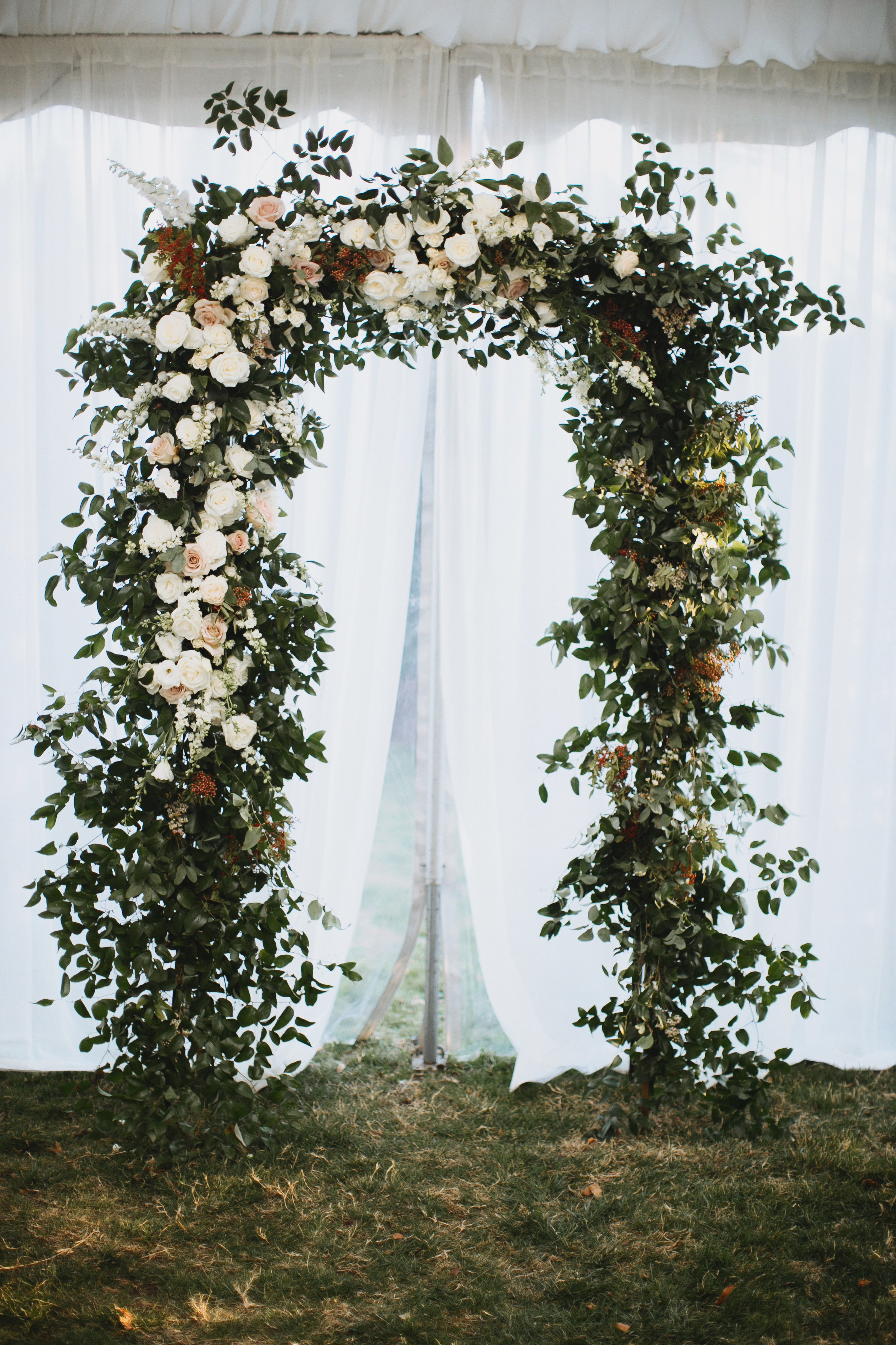 Lush Arch with lots of greenery and white and blush florals // Nashville Wedding Floral Design
