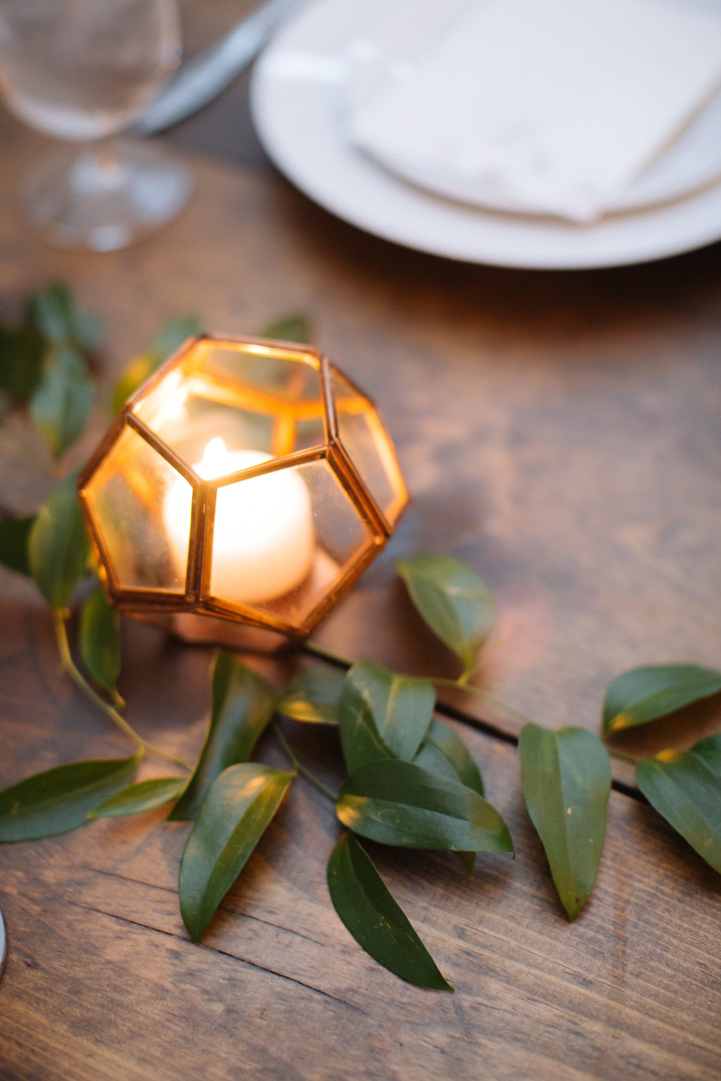 Geometric copper lantern with natural greenery accents // Nashville Wedding Floral Design