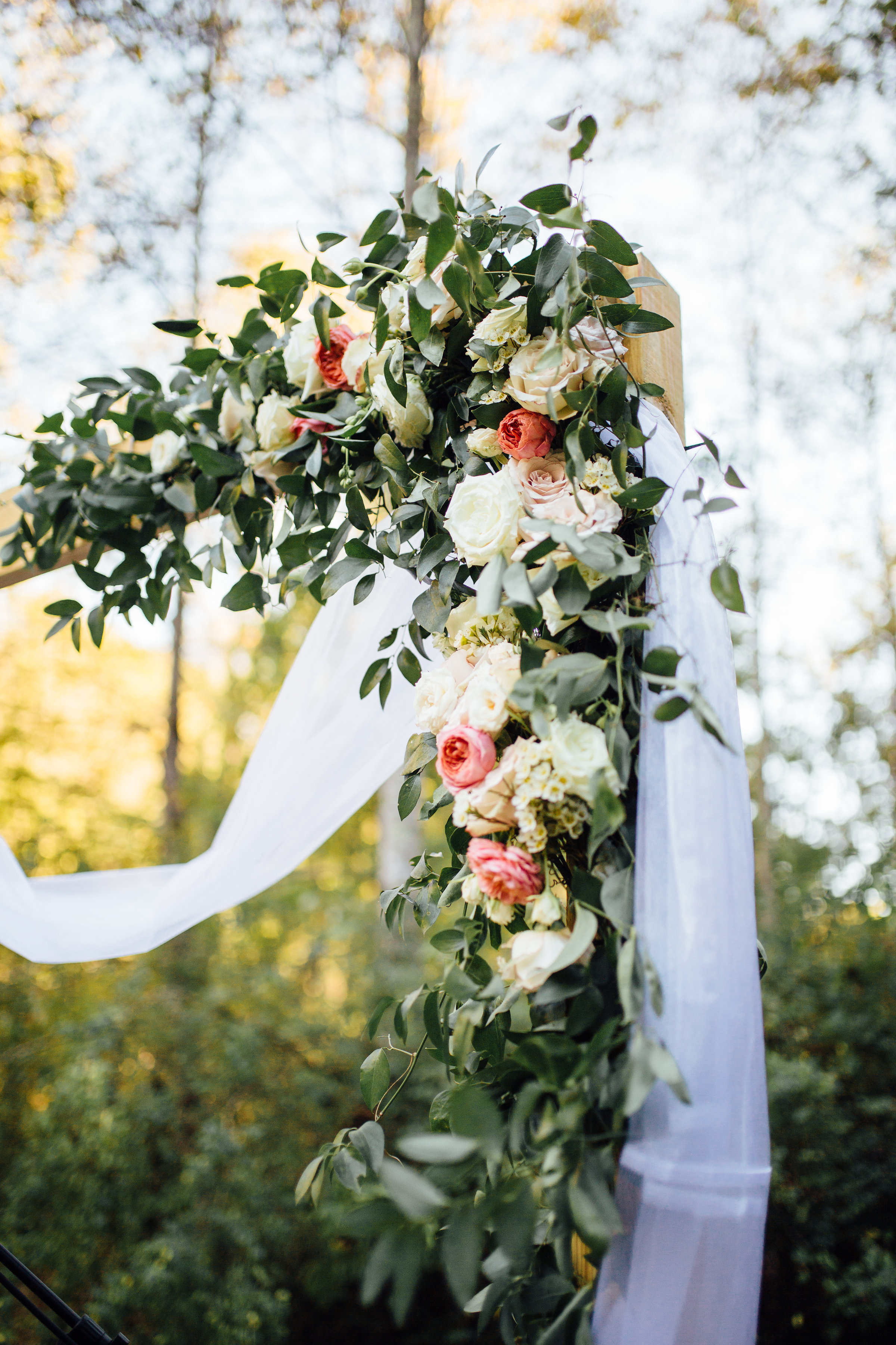 Natural, organic wedding ceremony backdrop with garden roses and ranunculus // Nashville Wedding Florist