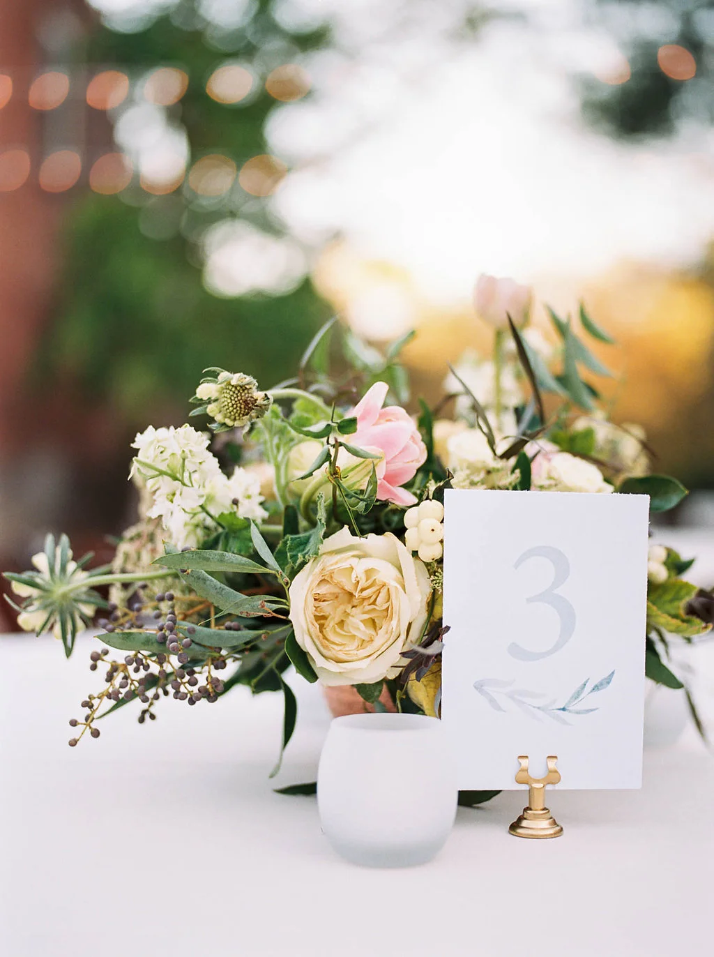 Loose, natural centerpiece with blush flowers and lots of texture and greenery // Nashville Wedding Florist