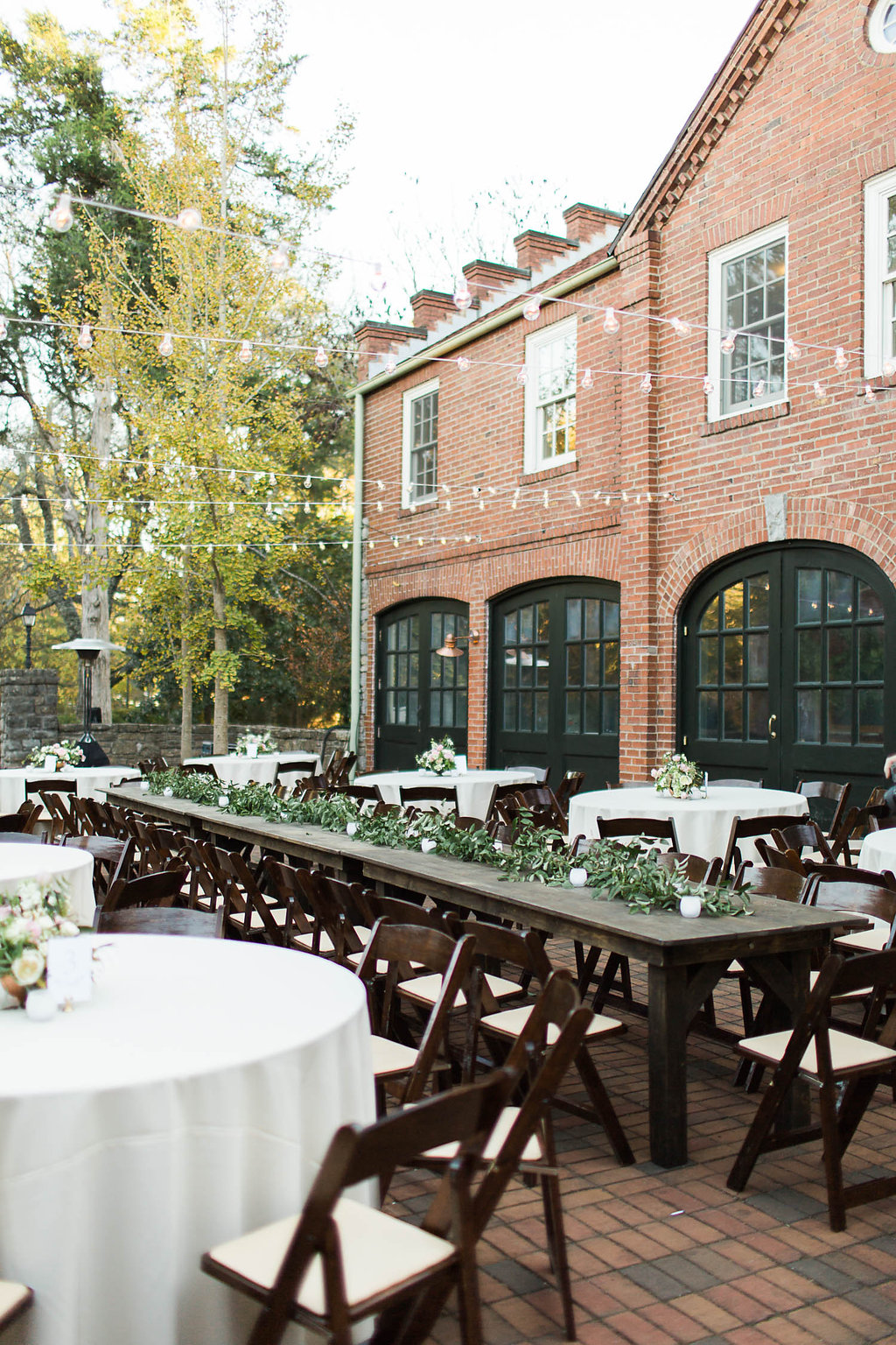 Lush greenery garland for the head table // Nashville Wedding Florist