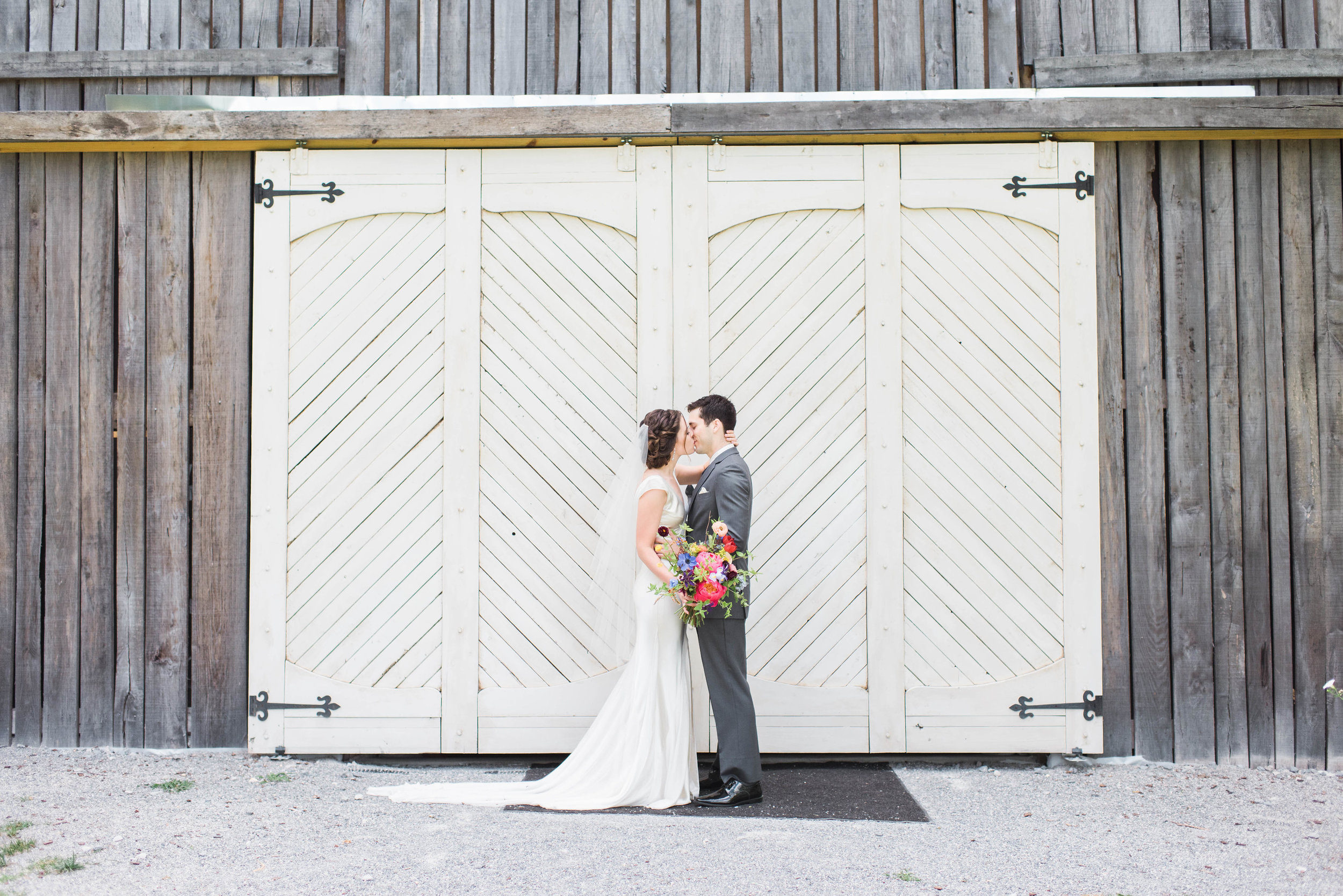 Natural, wildflower style bridal bouquet with peonies, strawflower, anemones, dahlias, ranunculus // Chagall inspired wedding flower in Nashville