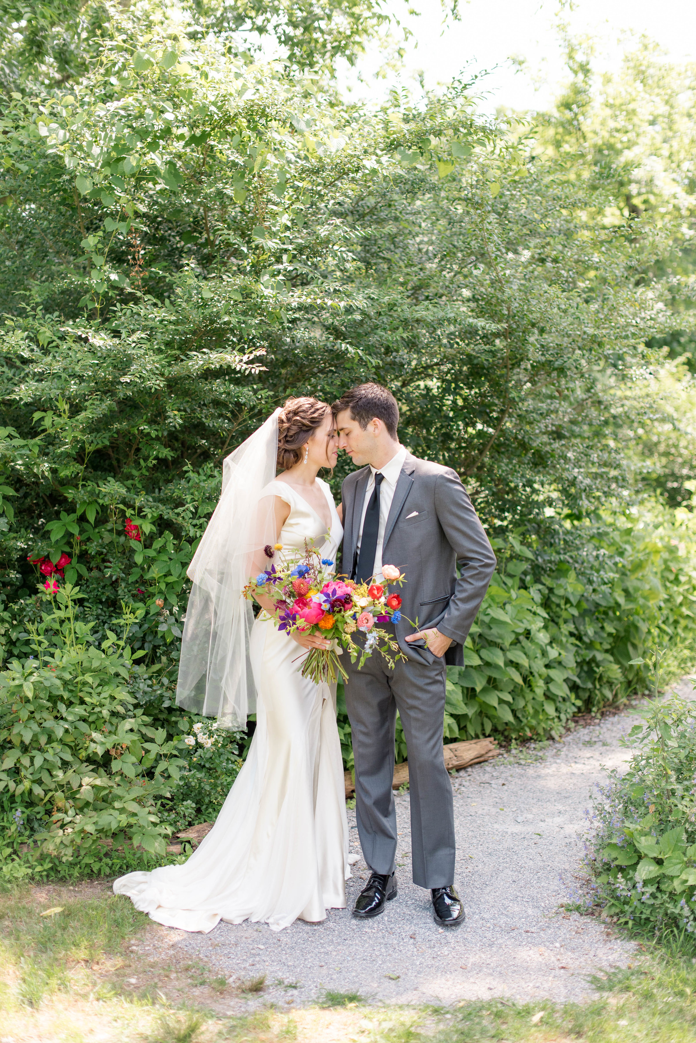 Natural, wildflower style bridal bouquet with peonies, strawflower, anemones, dahlias, ranunculus // Chagall inspired wedding flower in Nashville