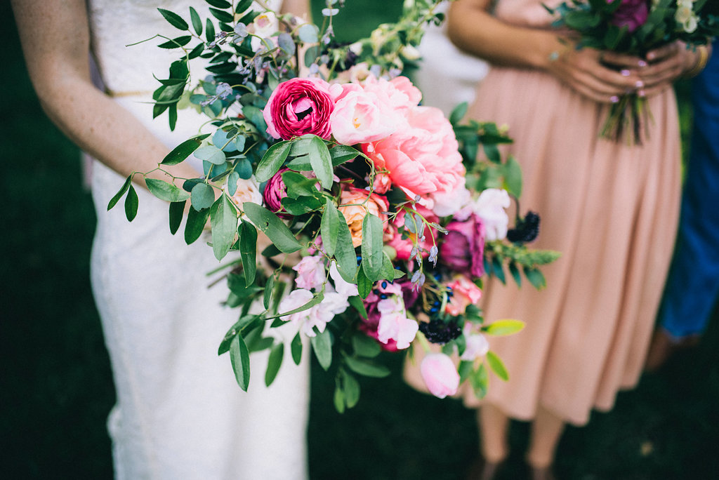 Lush, berry toned bridal bouquet with peonies and ranunculus // Nashville Wedding Florist