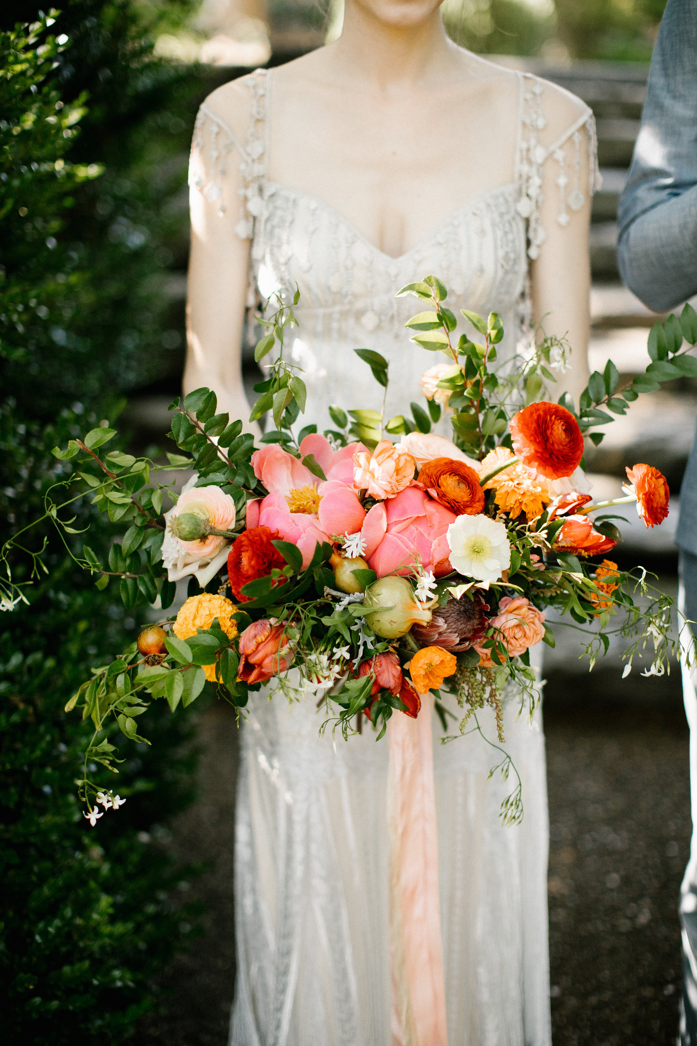 Summery, organic bridal bouquet with ranunculus, peonies, and Icelandic poppies // Nashville Wedding Florist