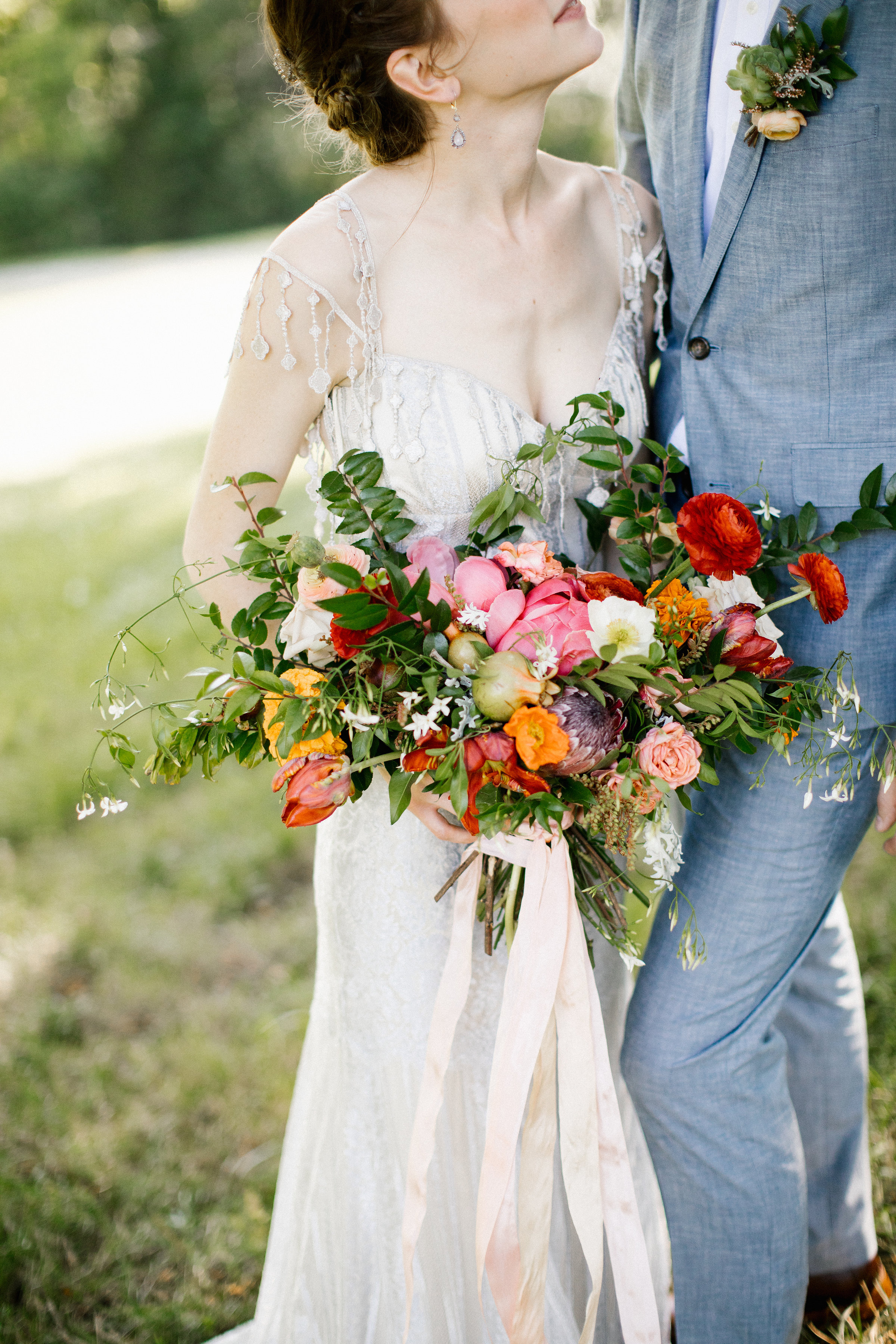 Summery, organic bridal bouquet with ranunculus, peonies, and Icelandic poppies // Nashville Wedding Florist