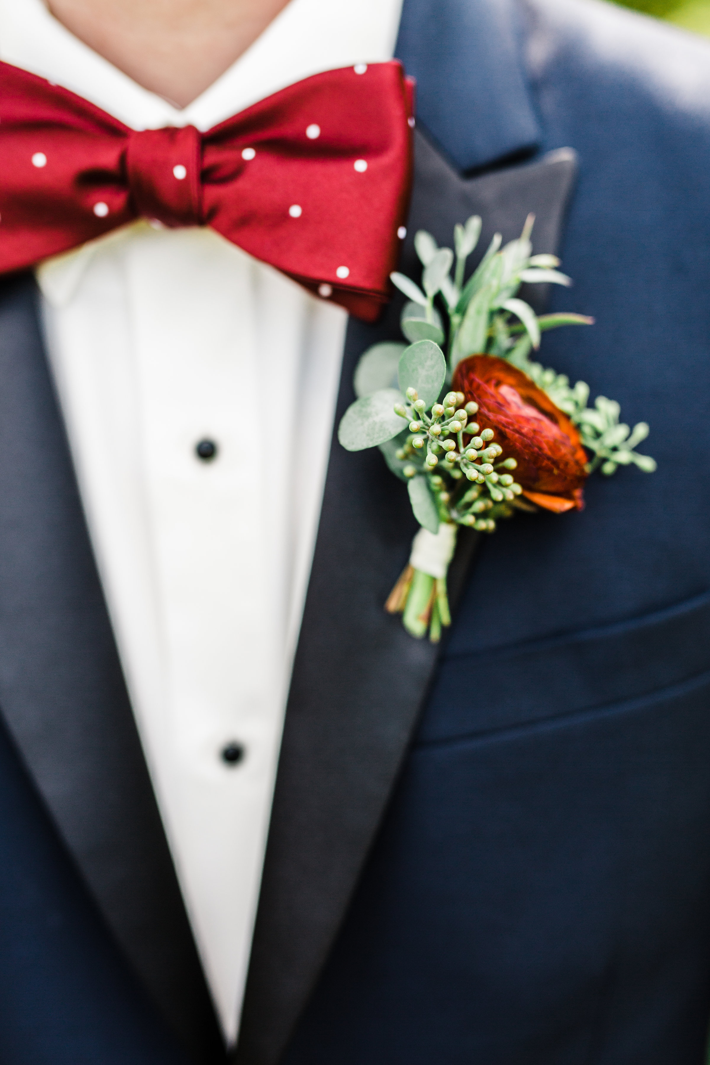 Deep red ranunculus boutonniere // Nashville Wedding Florist