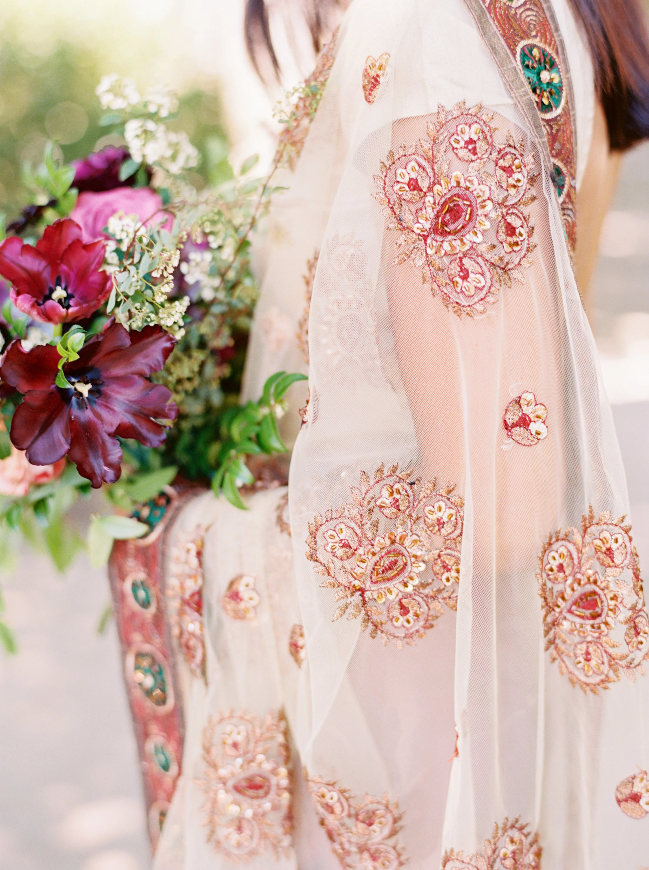 Marsala and plum bouquet of ranunculus, peonies, tulips, and lush greenery // Nashville Wedding Florist