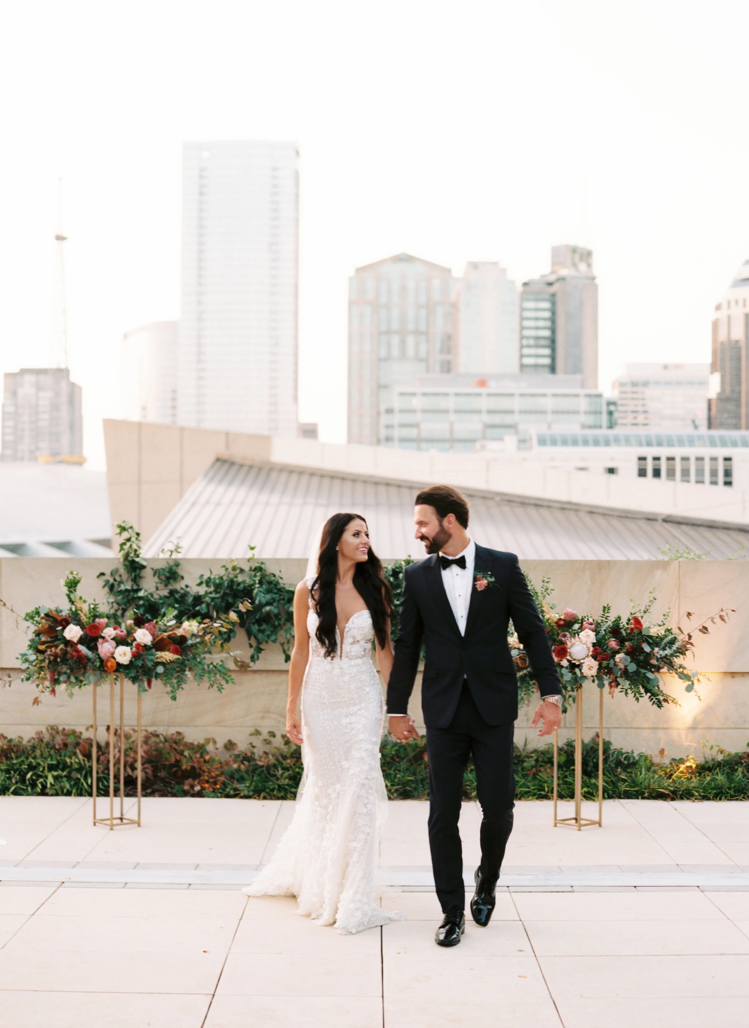 Blush and marsala wedding flowers with protea, ranunculus, and lots of greenery and texture // Country Music Hall of Fame Wedding, Nashville