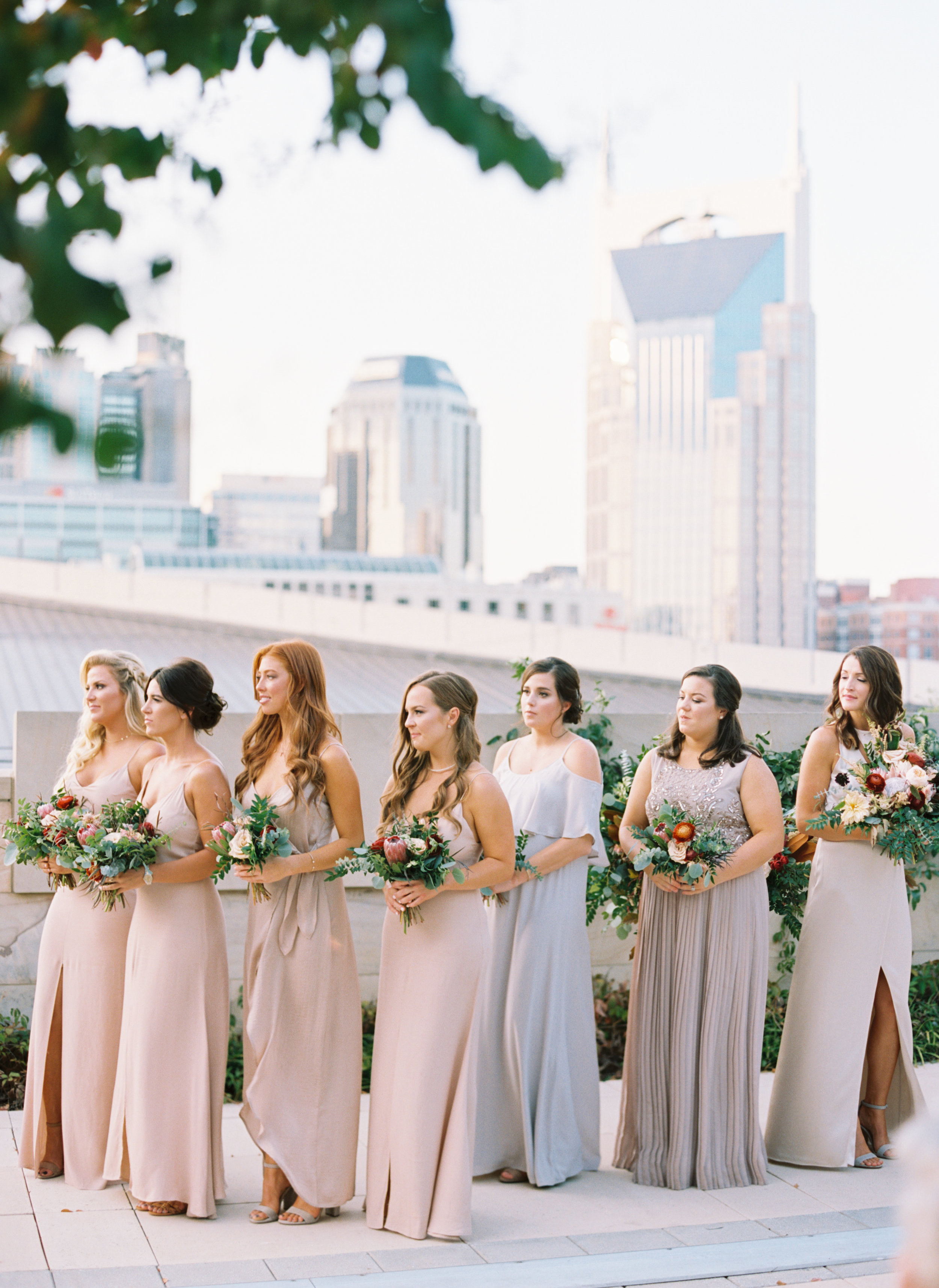 Blush and marsala wedding flowers with protea, ranunculus, and lots of greenery and texture // Country Music Hall of Fame Wedding, Nashville