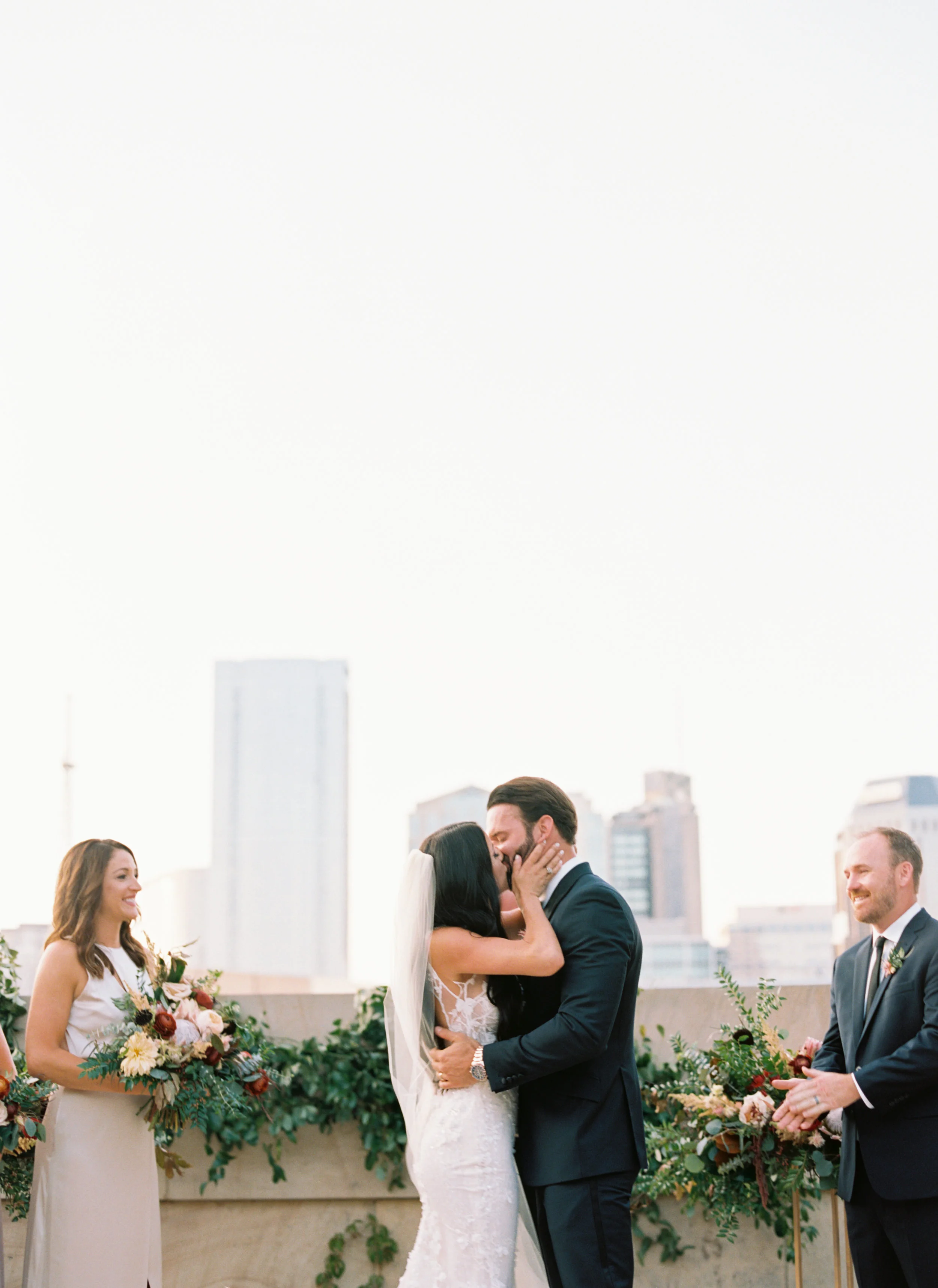 Blush and marsala wedding flowers with protea, ranunculus, and lots of greenery and texture // Country Music Hall of Fame Wedding, Nashville