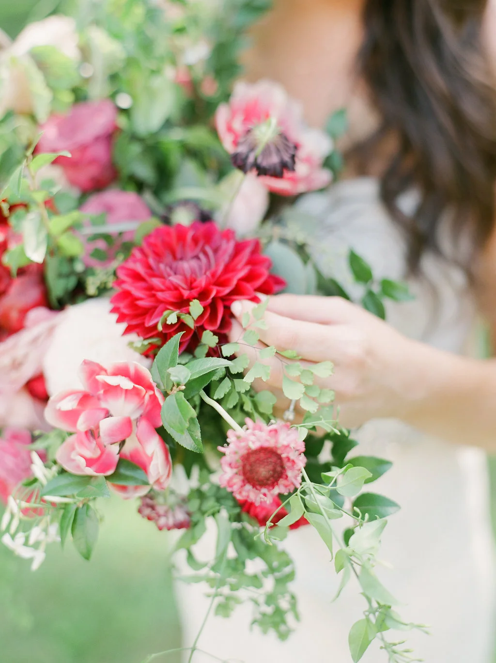 Lush bridal bouquet with marsala dahlias, pink tulips, burgundy peonies, pink ranunculus, and maidenhair fern // Belle Meade Wedding Floral Design