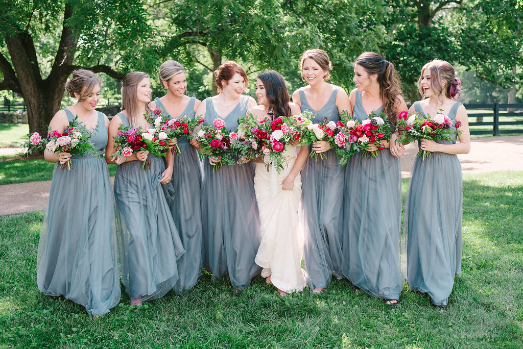 Lush bridal bouquet with marsala dahlias, pink tulips, burgundy peonies, pink ranunculus, and maidenhair fern, gray bridesmaid dresses // Belle Meade Wedding Floral Design