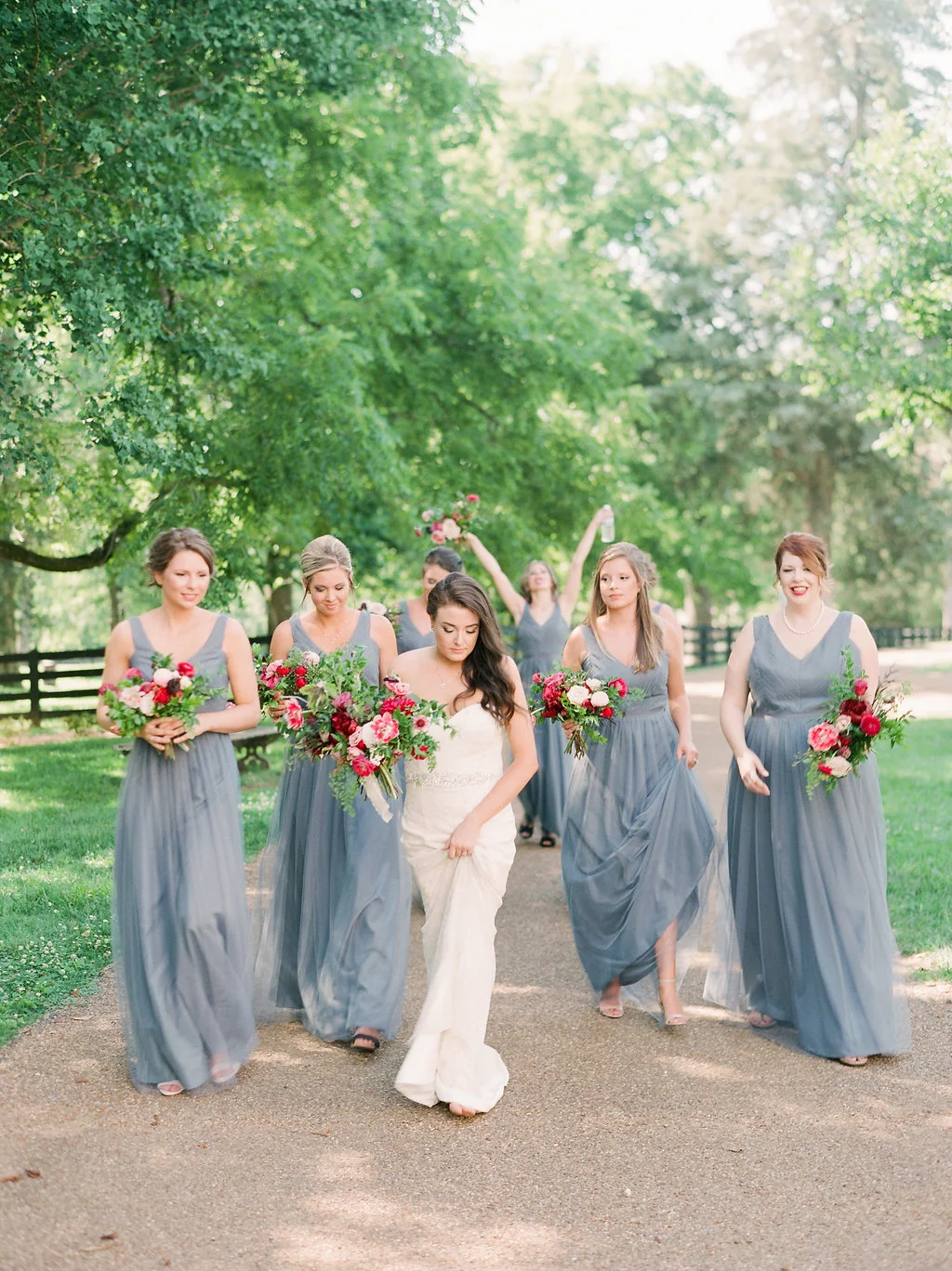 Lush bridal bouquet with marsala dahlias, pink tulips, burgundy peonies, pink ranunculus, and maidenhair fern // Belle Meade Wedding Floral Design