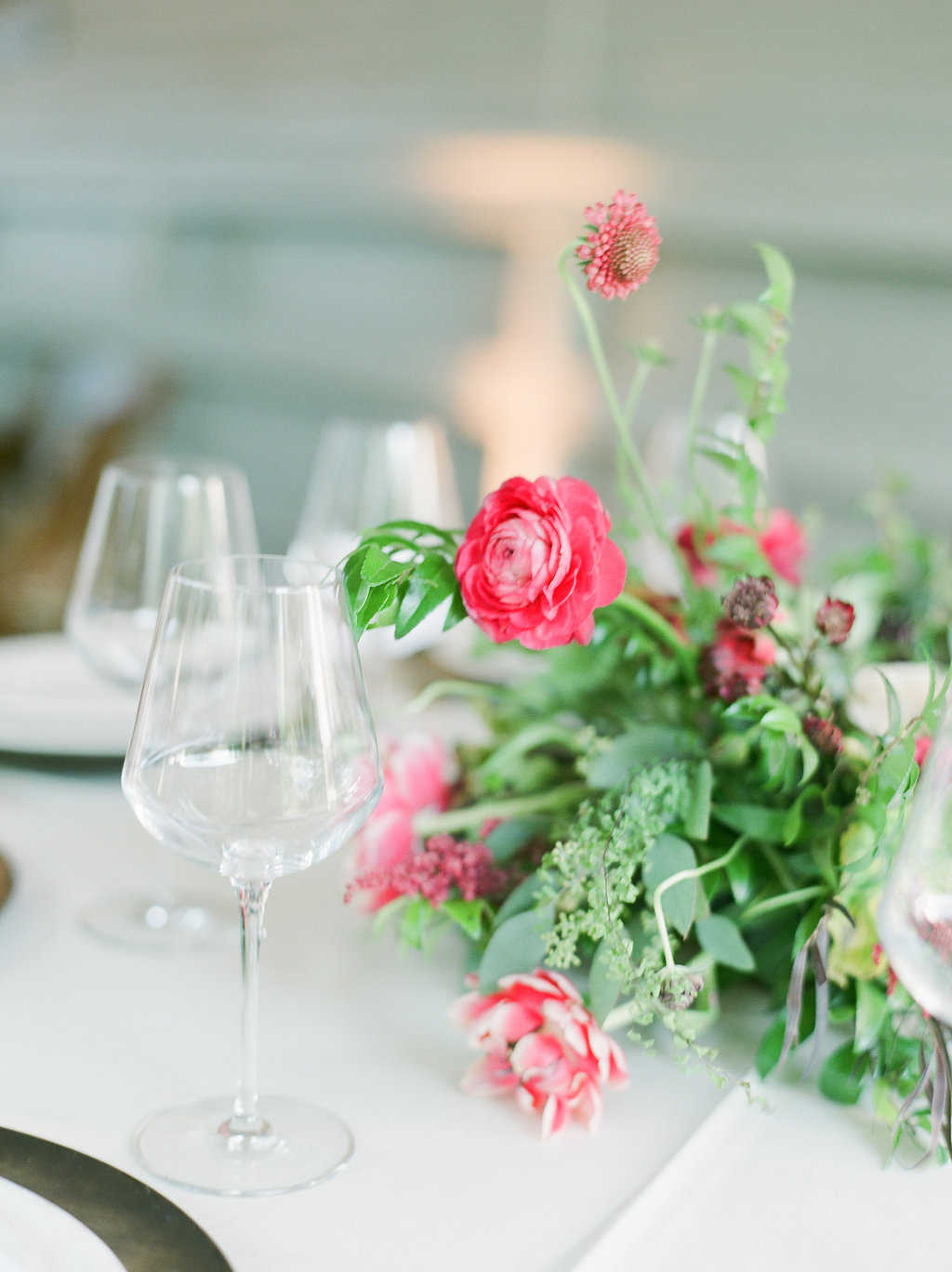 Pink and marsala centerpiece with ranunculus and tulips // Nashville Wedding Florist