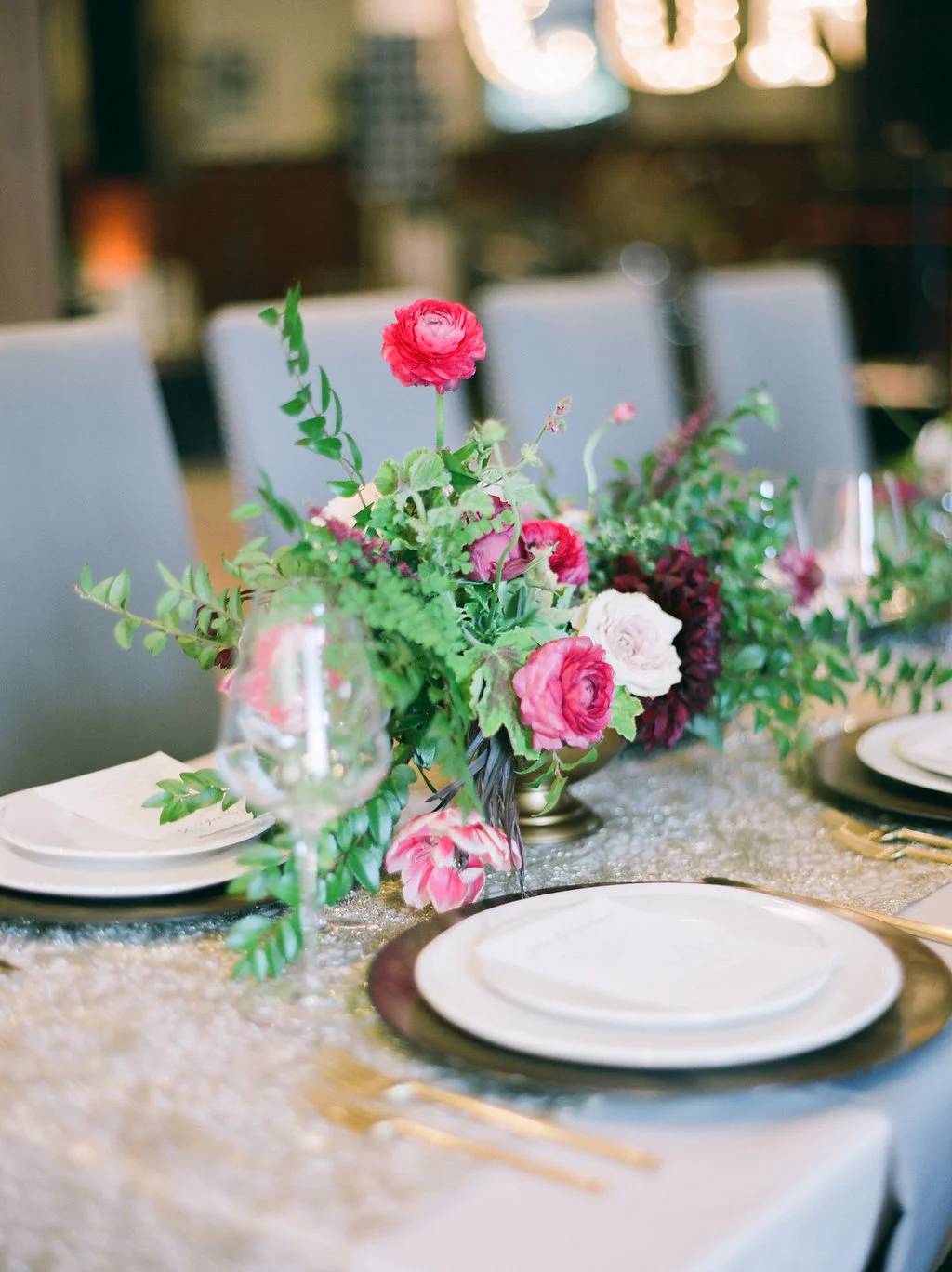Raspberry and marsala floral centerpiece with ranunculus, tulips, and garden roses // Nashville Wedding Florist // Belle Meade Plantation Carriage House Reception