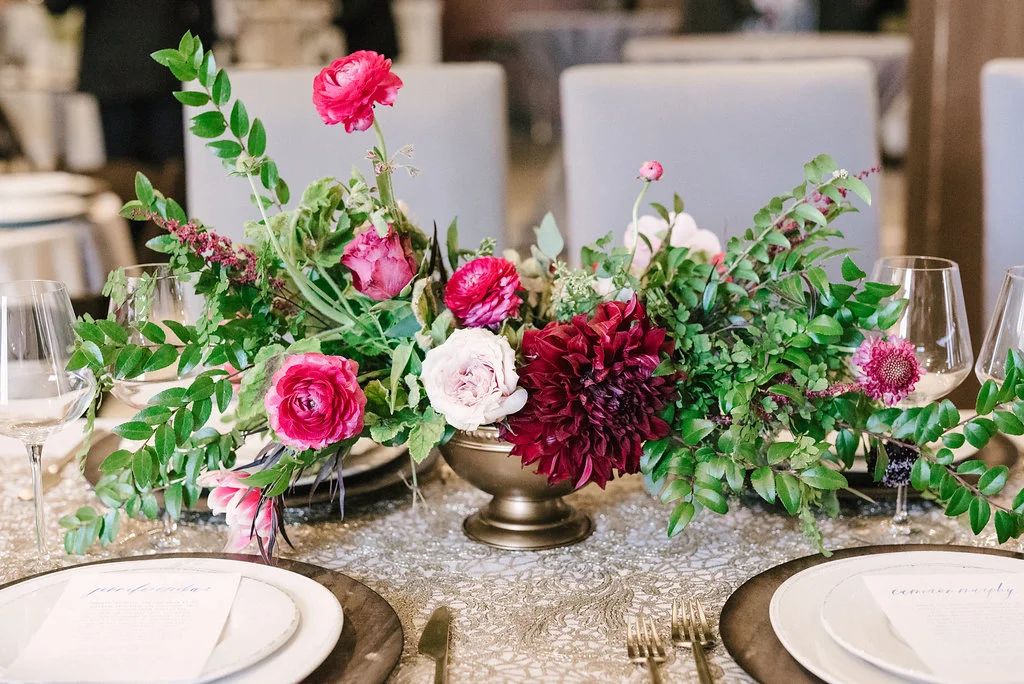 Raspberry and marsala floral centerpiece with ranunculus, tulips, and garden roses // Nashville Wedding Florist // Belle Meade Plantation Carriage House Reception