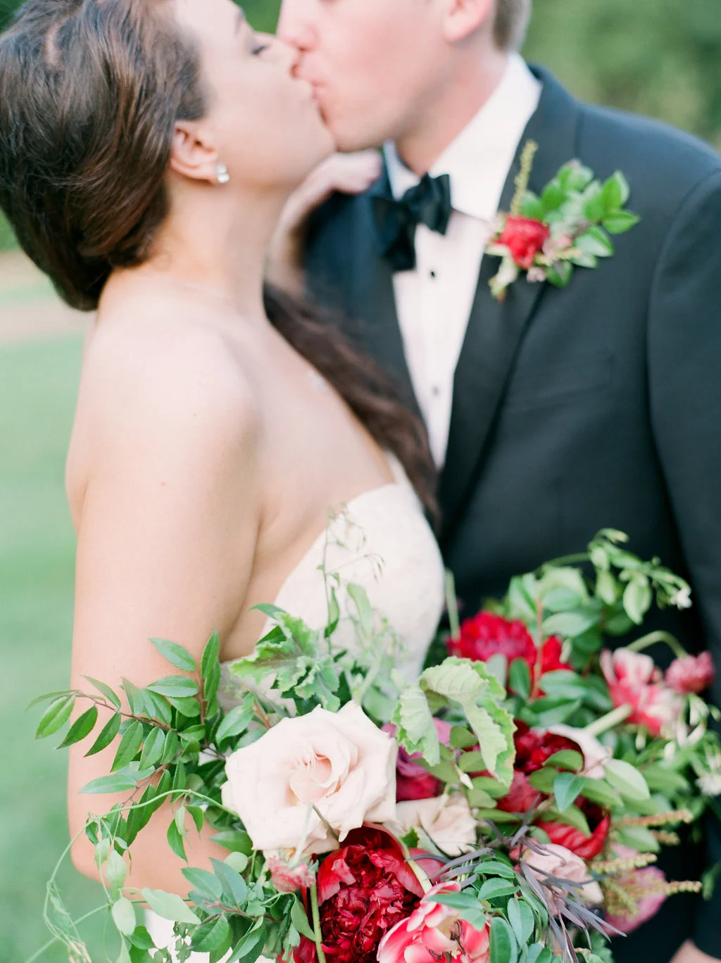 Raspberry and marsala floral centerpiece with ranunculus, tulips, and garden roses // Nashville Wedding Florist // Belle Meade Plantation Carriage House Reception