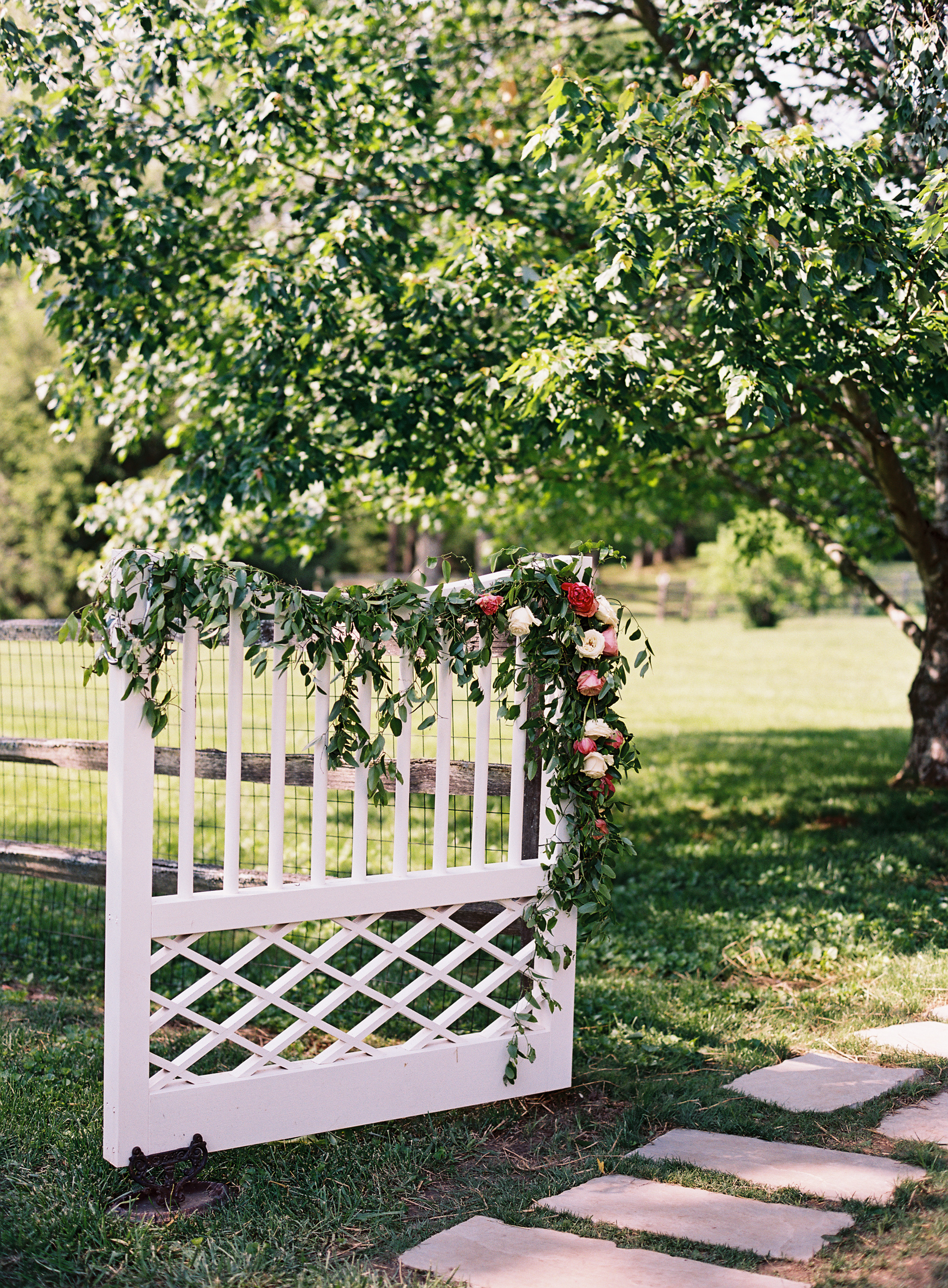 Lush, trailing garland on the gate  // Nashville Wedding Floral Design