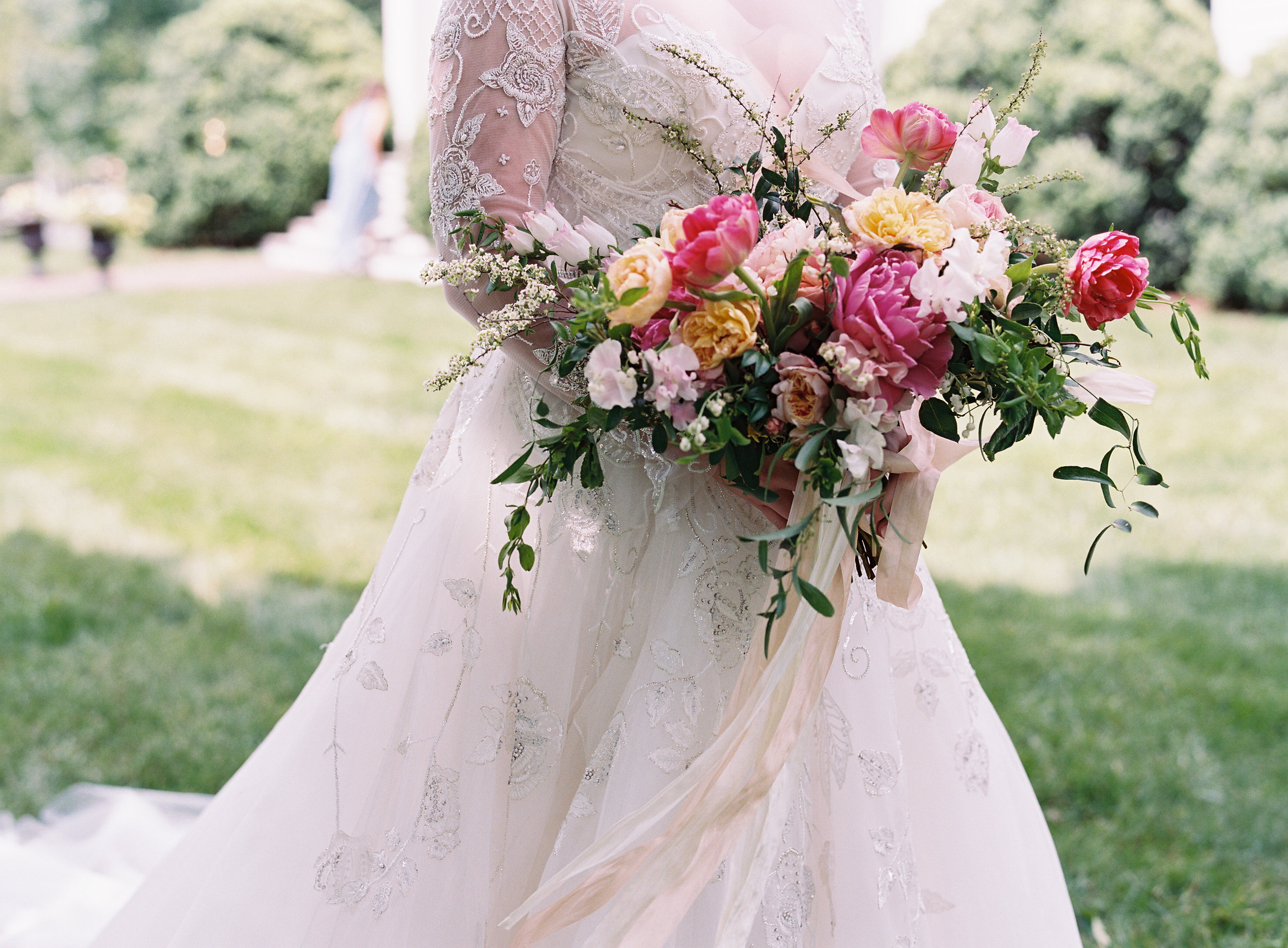 Lush bridal bouquet of pink peonies, tulips, lily of the valley, garden roses, and blush sweet peas  // Nashville Wedding Floral Design