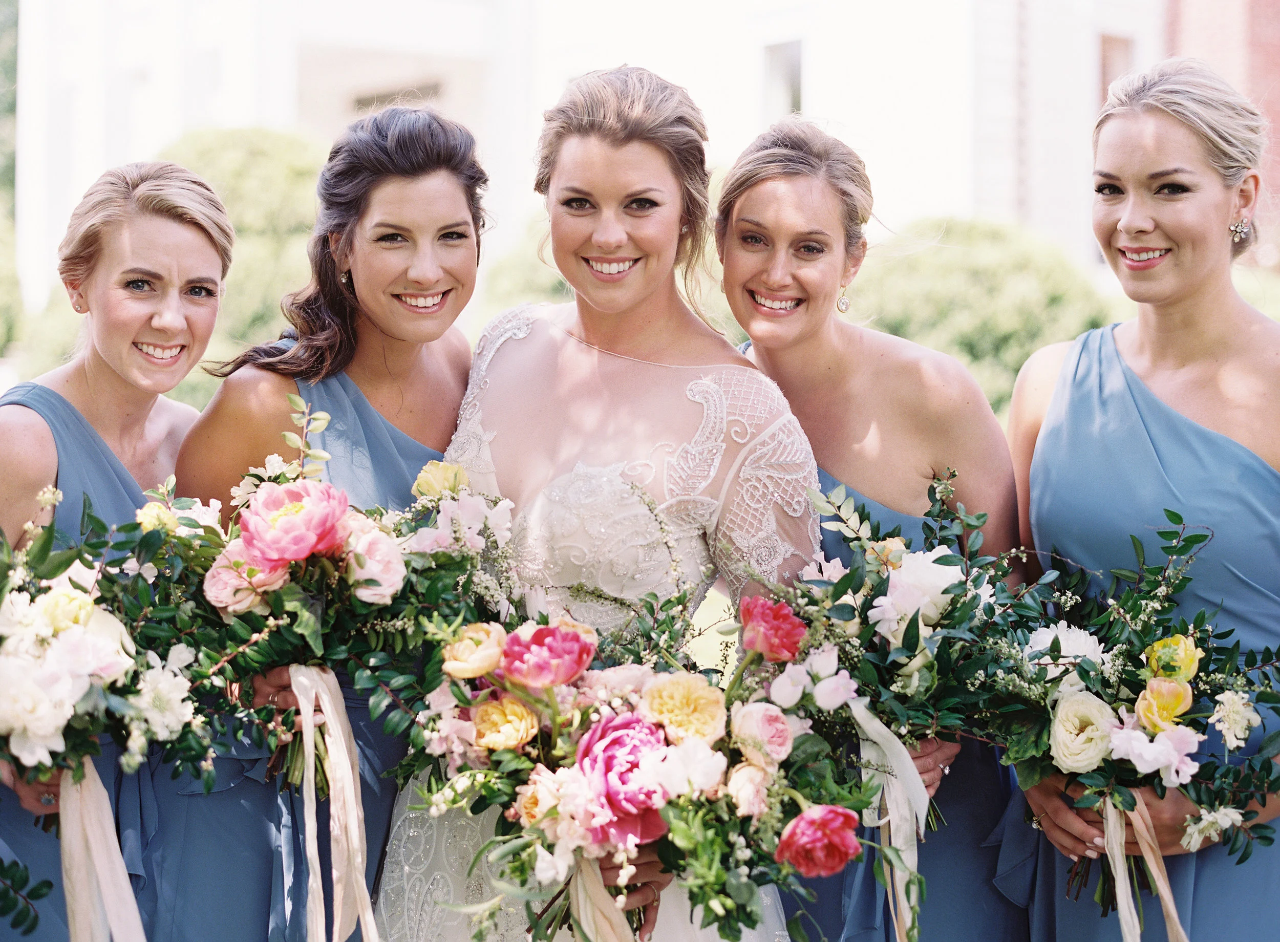 Lush bridal bouquet of peonies, tulips, lily of the valley, garden roses, and sweet peas  // Nashville Wedding Floral Design