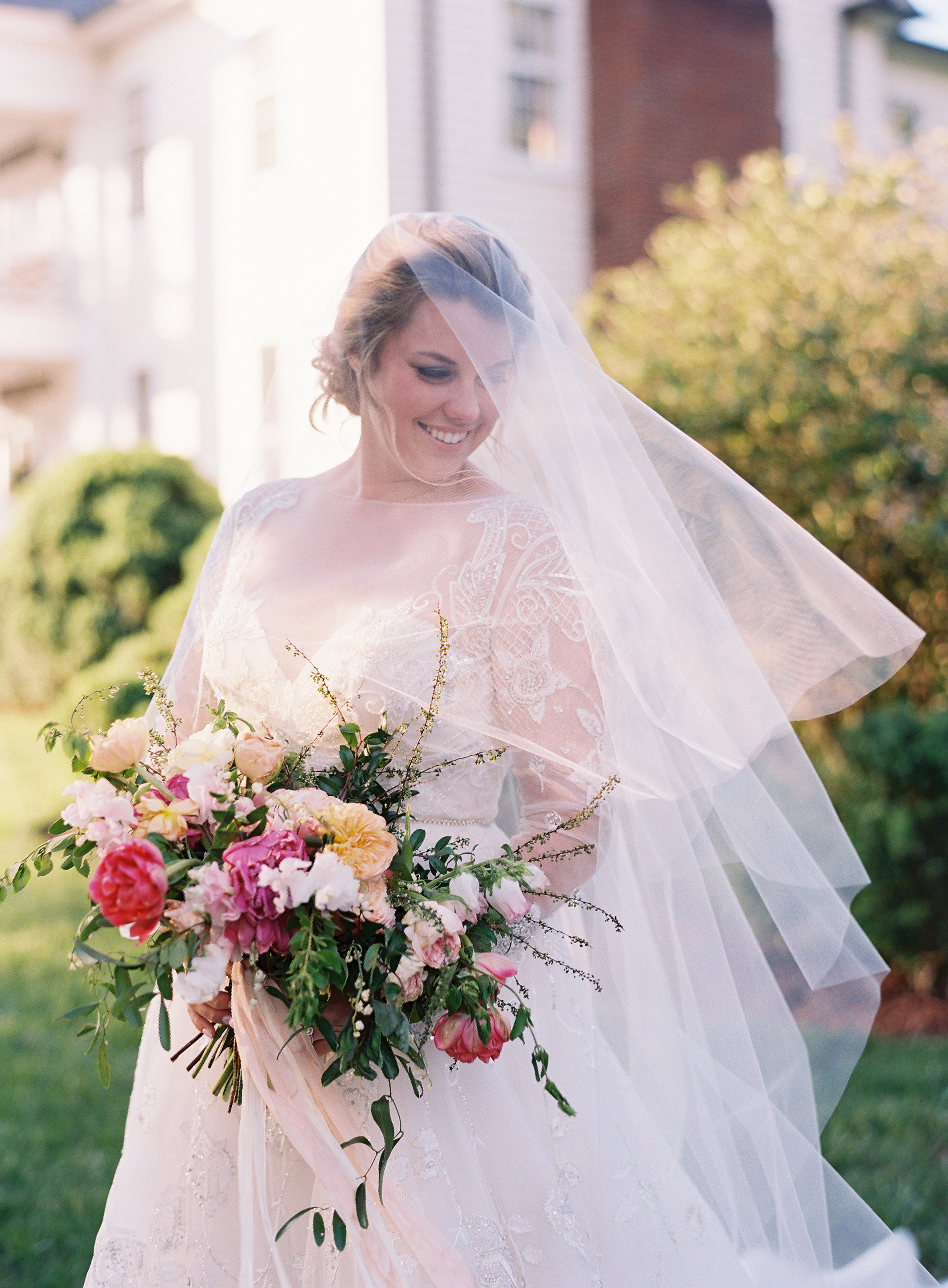 Organic bridal bouquet with blush sweet peas, homegrown pink peonies, California garden roses, and airy greenery // Nashville Wedding Floral Design