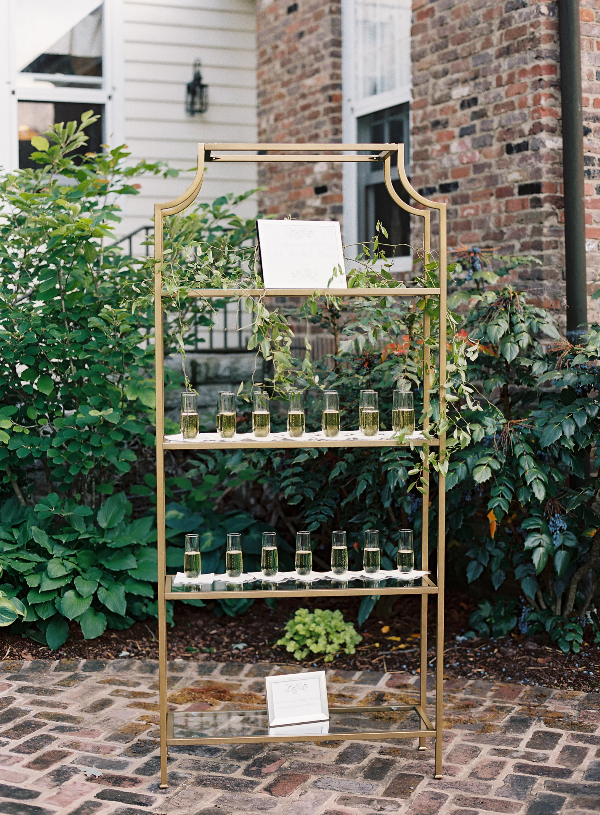 Champagne stand to welcome guests // Nashville Wedding Florist
