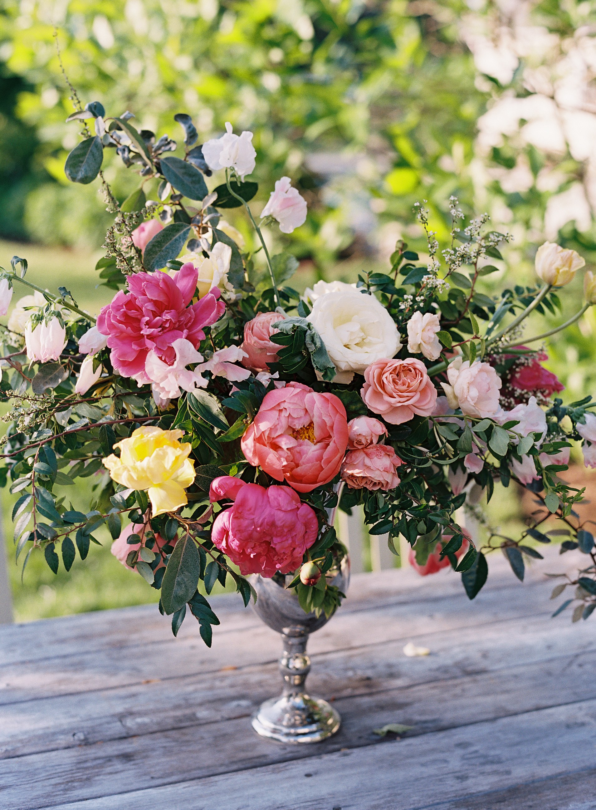 Organic arrangement with homegrown pink peonies, blush sweet peas, spirea, lush greenery // Nashville Wedding Florist