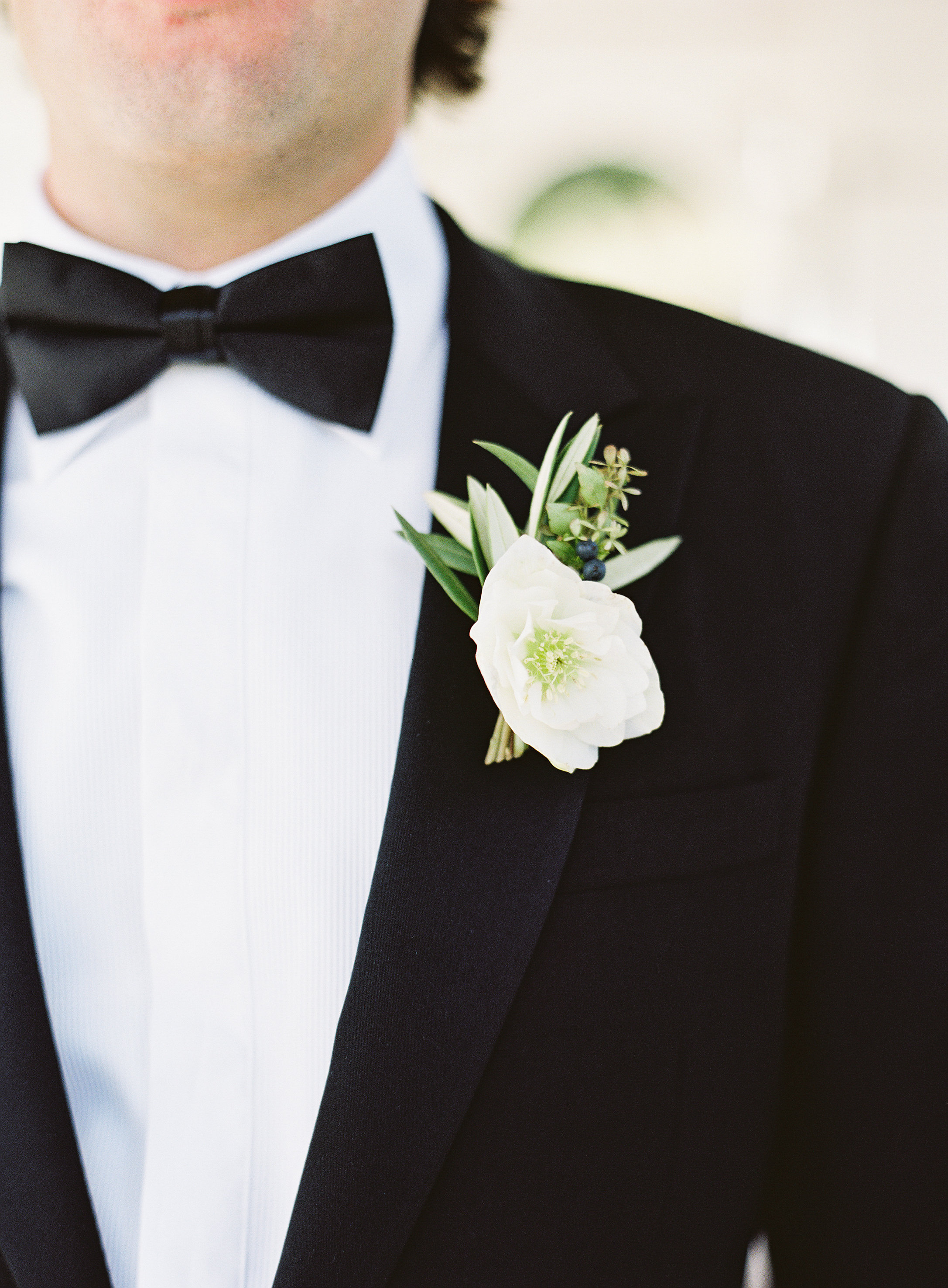 Hellebore and greenery boutonniere // Blackberry Farm Wedding Floral Design