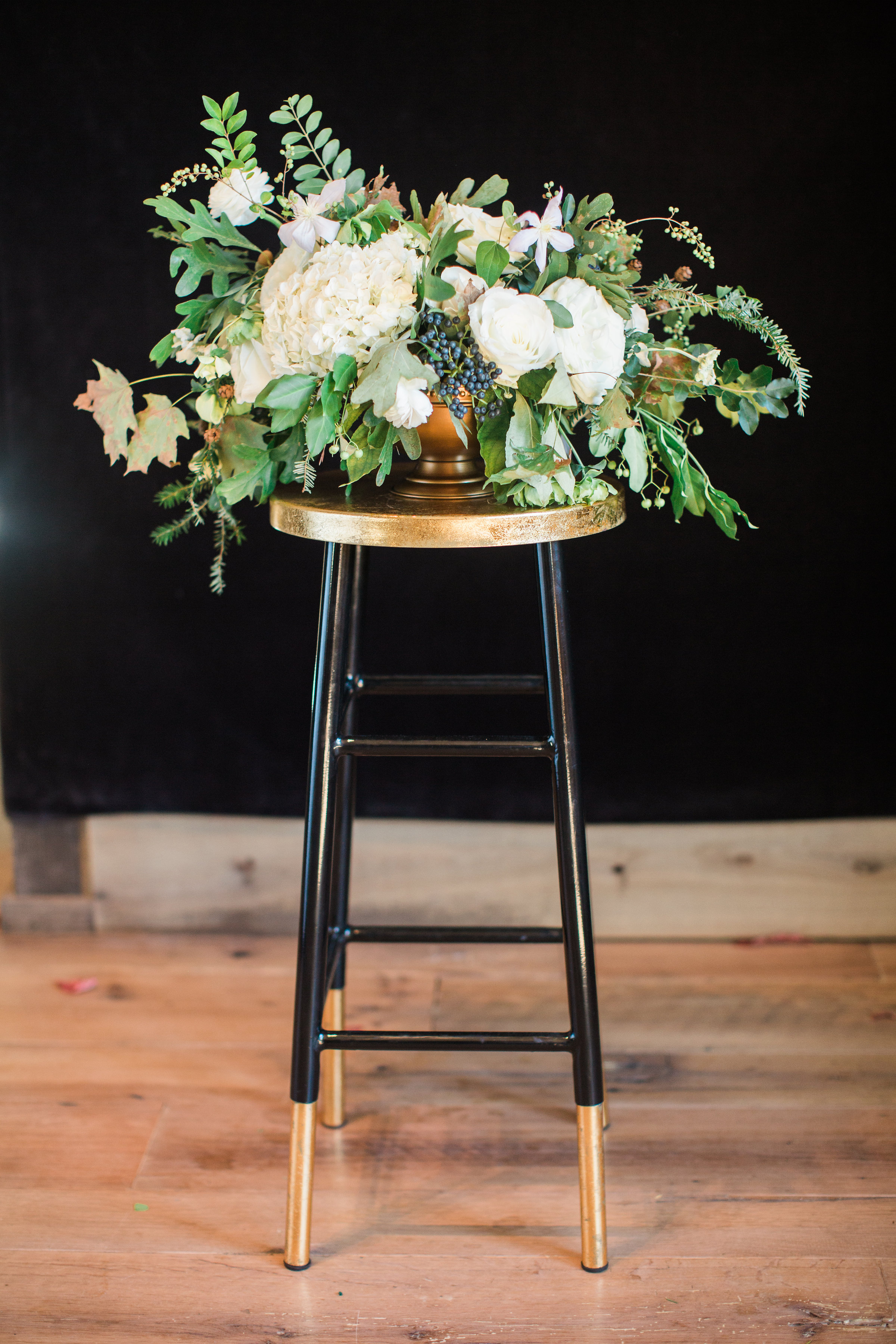 Lush centerpiece with all white flowers and organic greenery // Blackberry Farm Wedding Floral Design