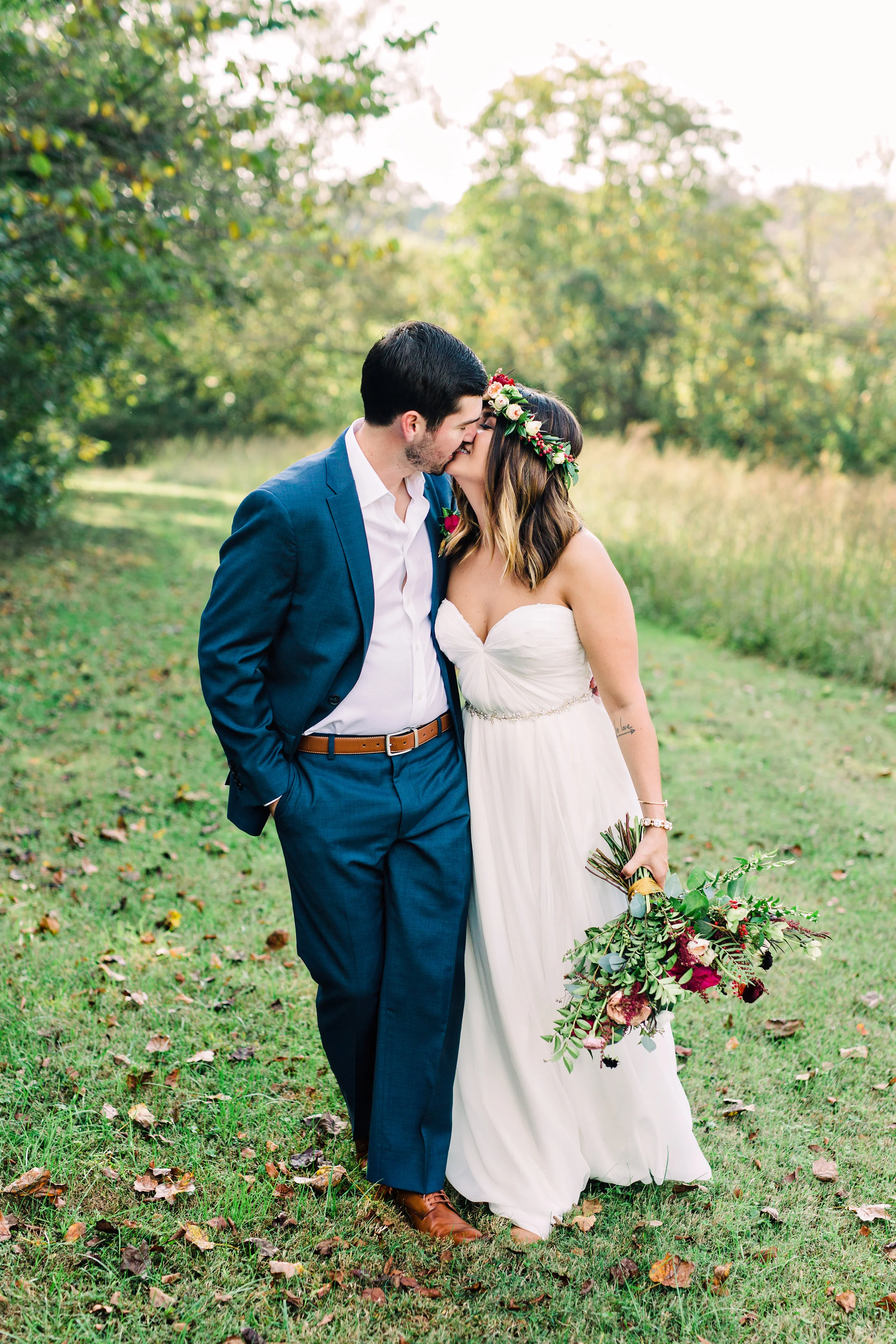 Lush, organic bridal bouquet with marsala ranunculus and garden roses // Nashville Wedding Florist