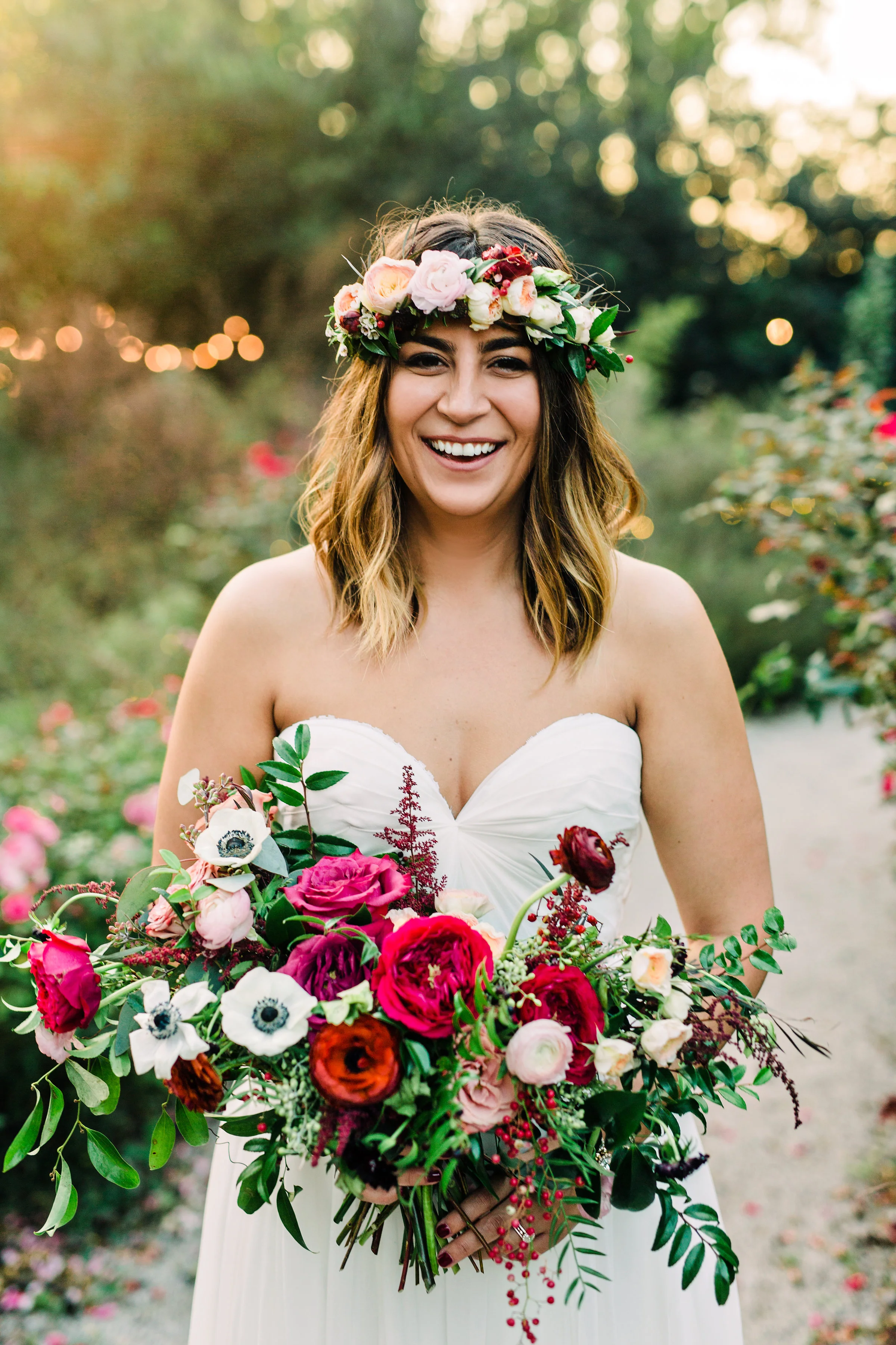 Lush, untamed wedding flowers using deep red and burgundy garden roses and ranunculus // Nashville Wedding Florist