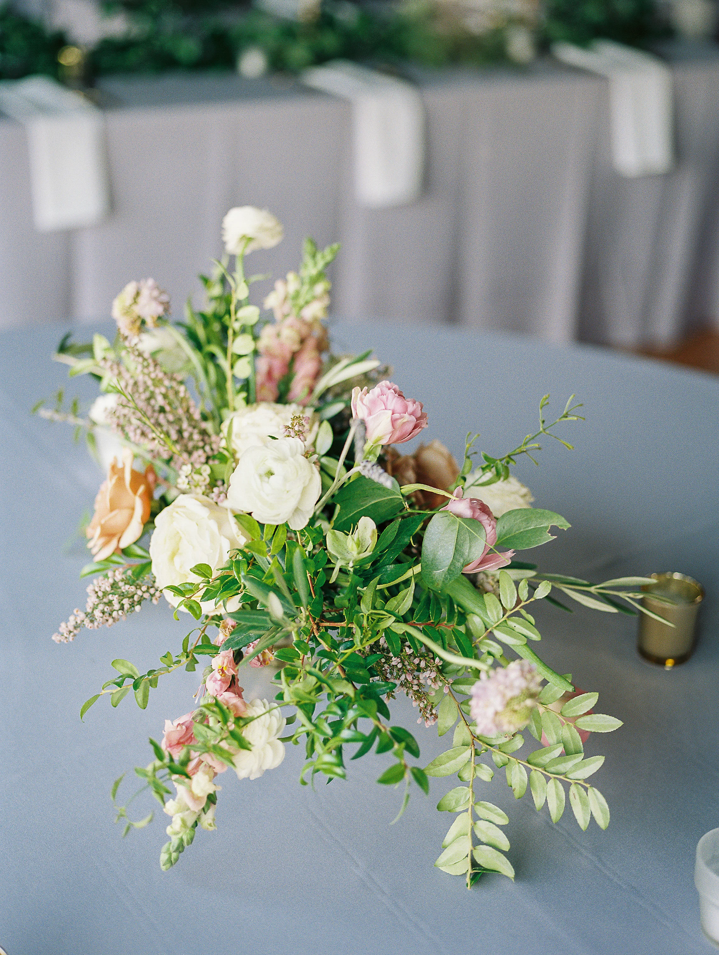 Low, organic centerpiece with white and lavender florals // Nashville Wedding Florist at Cannery One