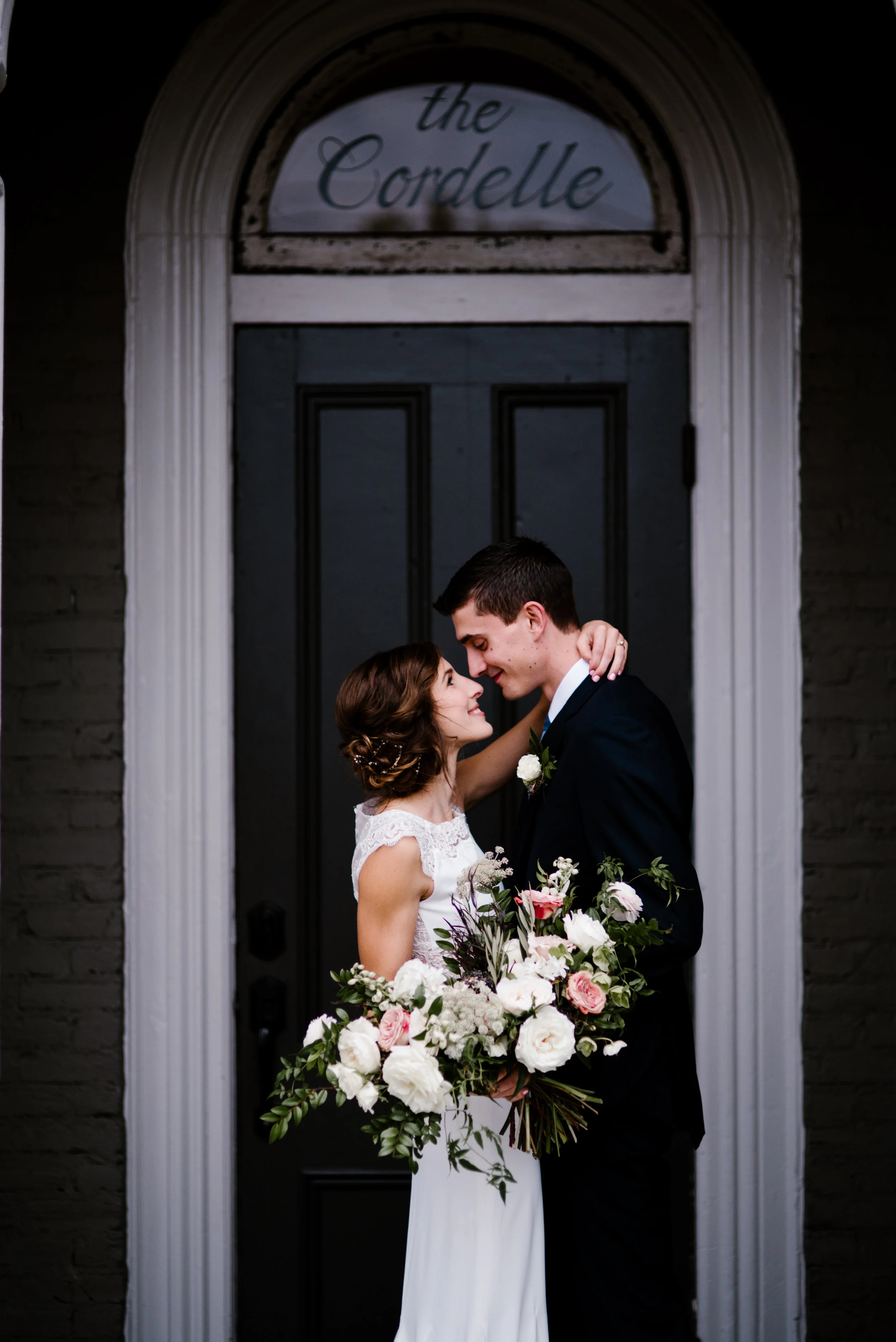 Muted, organic bridal bouquet with white, blush, and copper flowers // Nashville Wedding Florist at the Cordelle