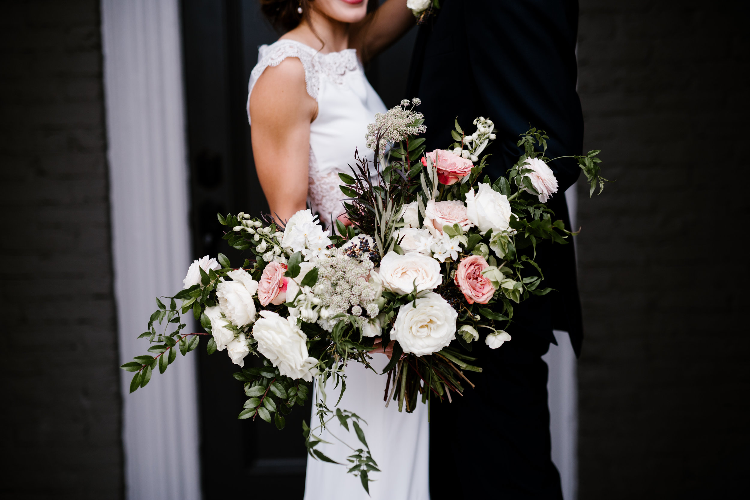 Muted, organic bridal bouquet with white, blush, and copper flowers // Nashville Wedding Florist at the Cordelle