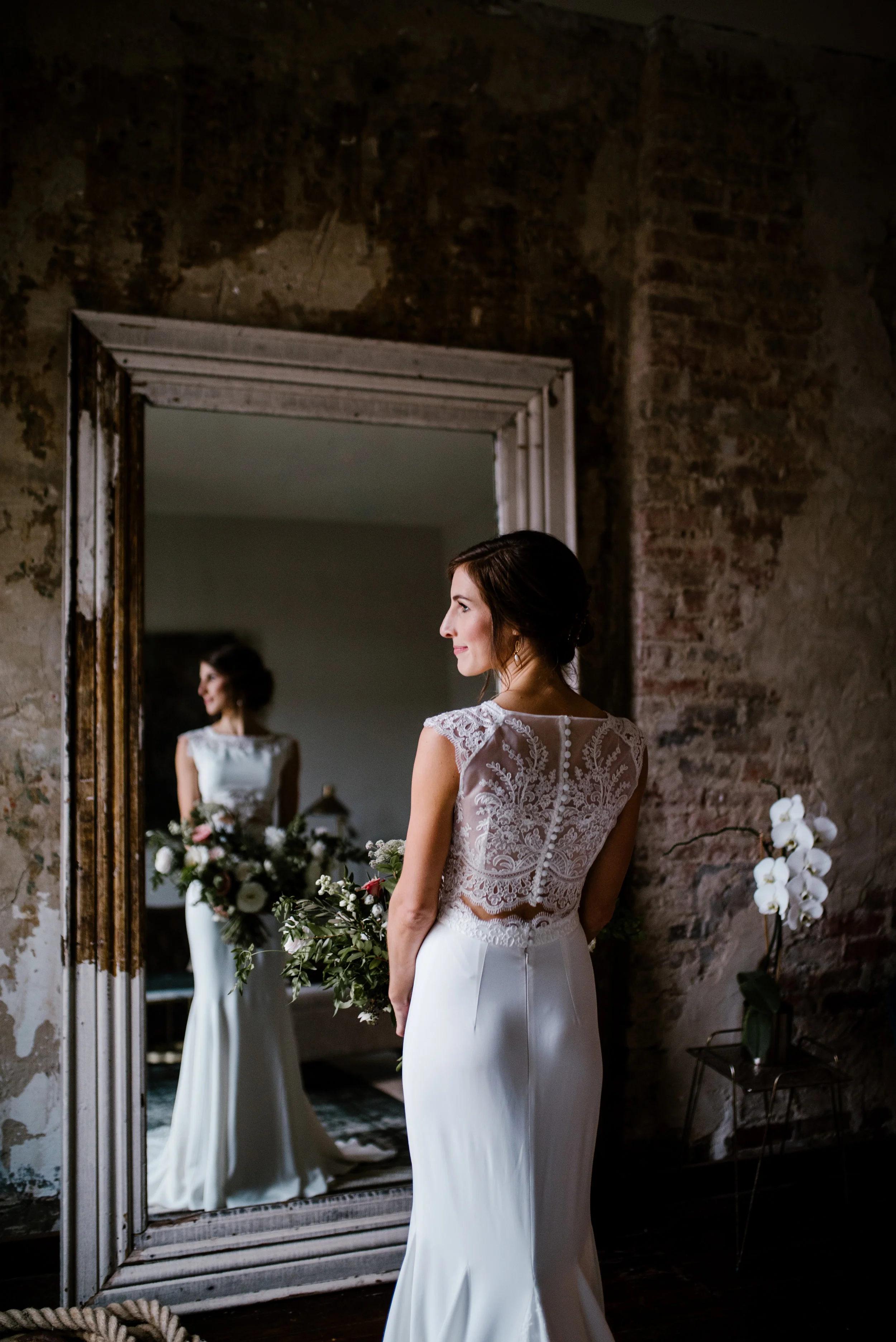 Muted, organic bridal bouquet with white, blush, and copper flowers // Nashville Wedding Floral Designer at the Cordelle