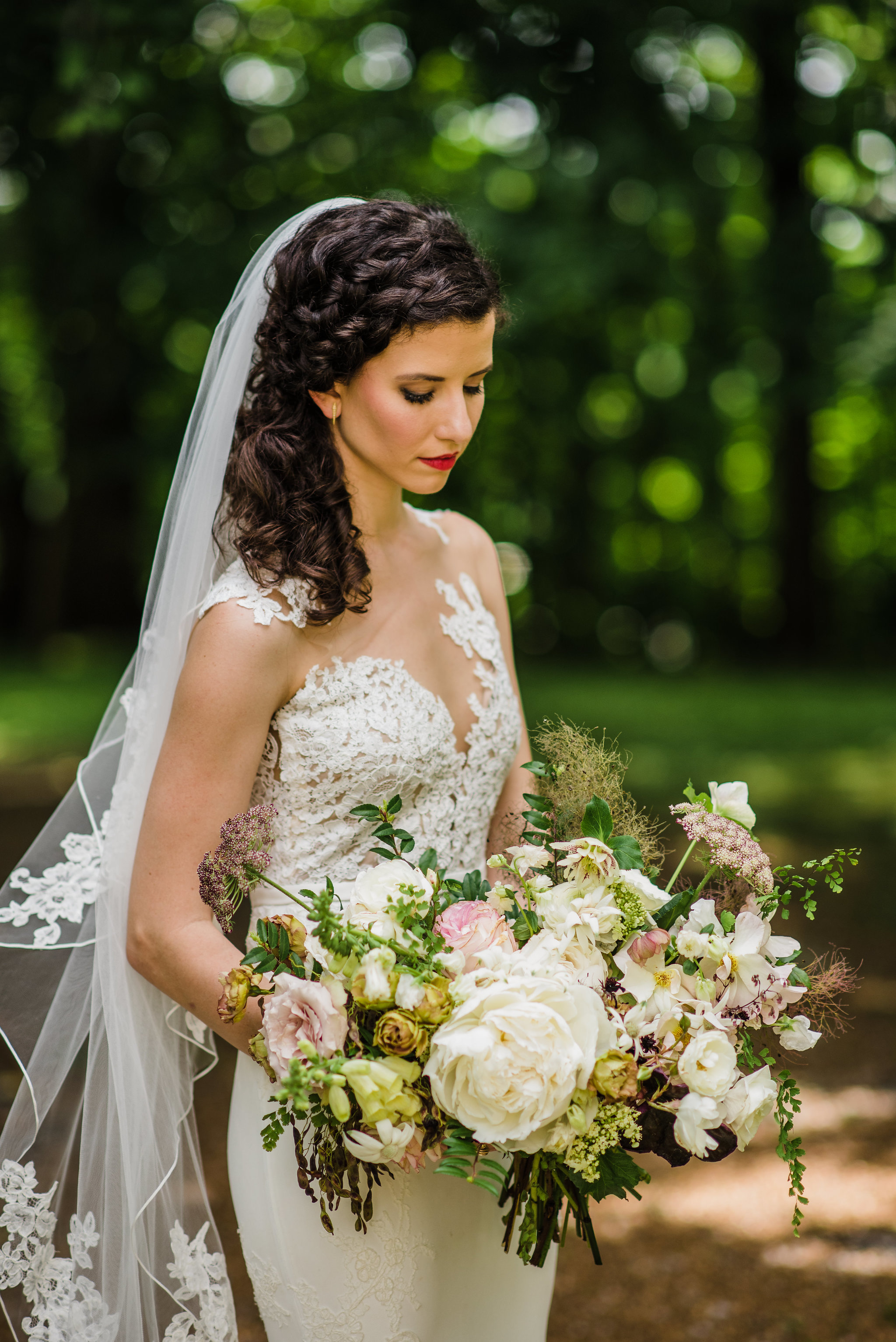 Organic, airy bridal bouquet with peonies, garden roses, greenery and lush textures // Nashville Wedding Florist