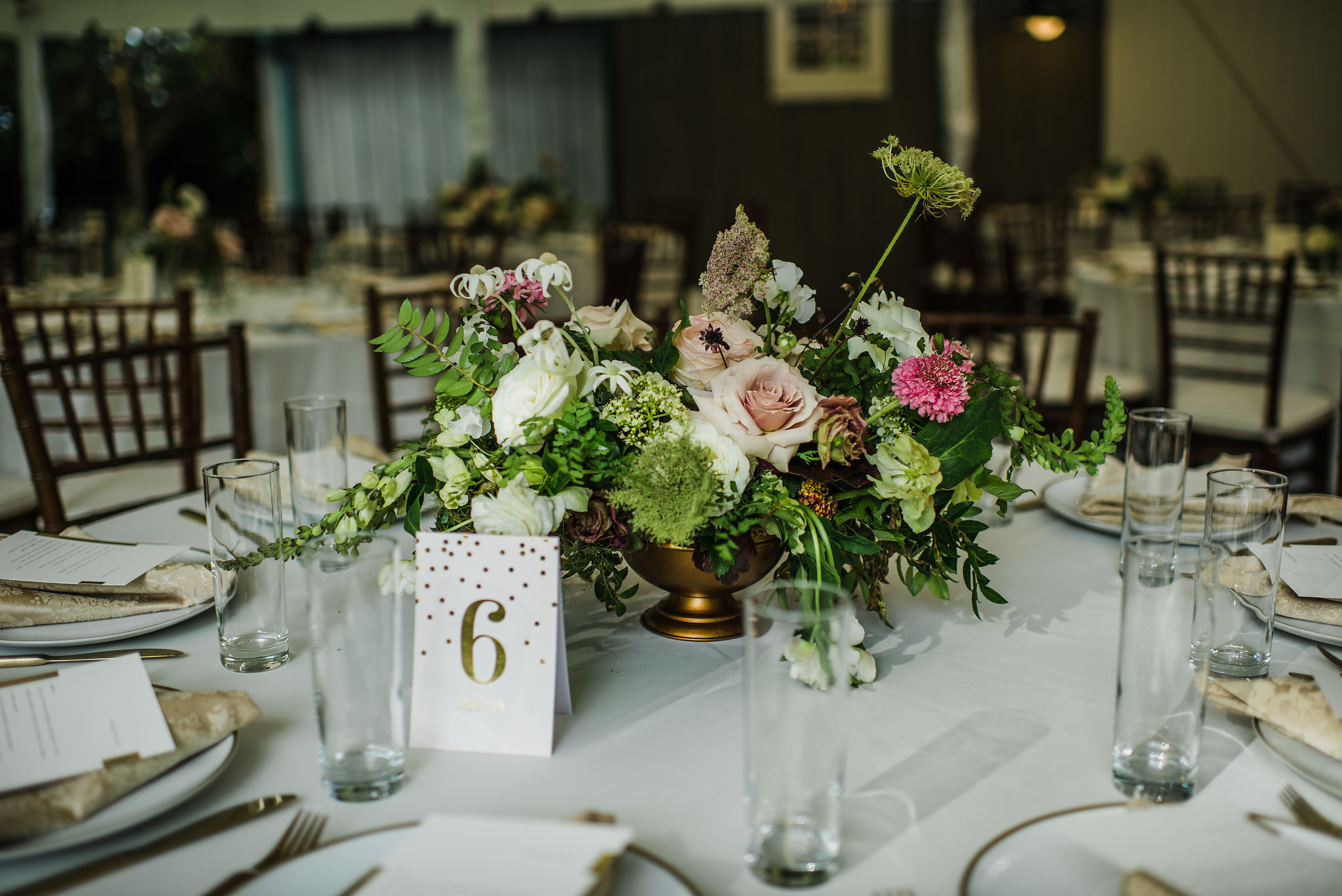 Art deco garden party wedding at Historic Travellers Rest in Nashville with organic, untamed floral design